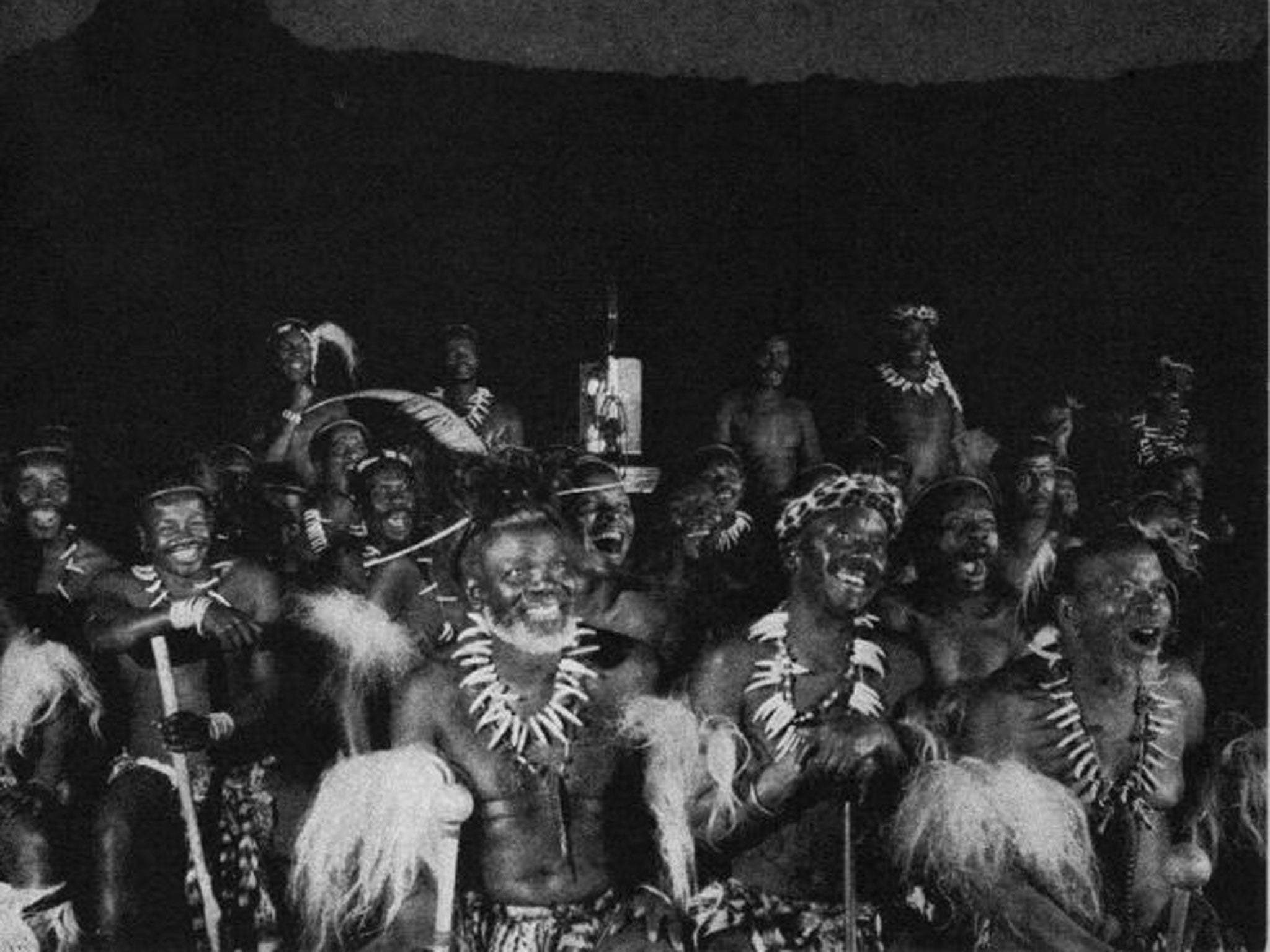 Zulu extras watch their first movie on the Zulu set ... it was a B-Western