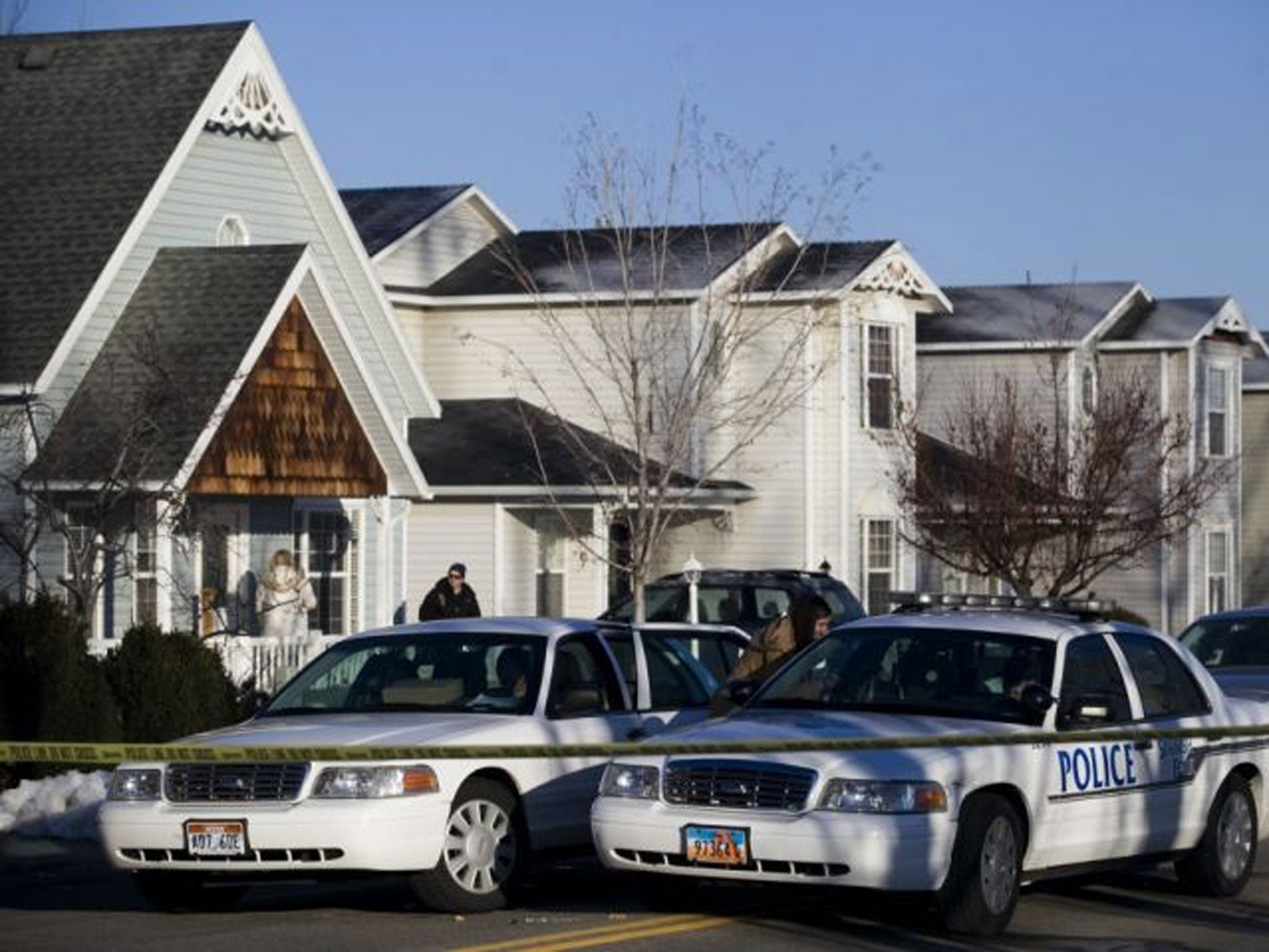 Police outside the Boren's home in Spanish Fork, Utah, where the family of five were found dead