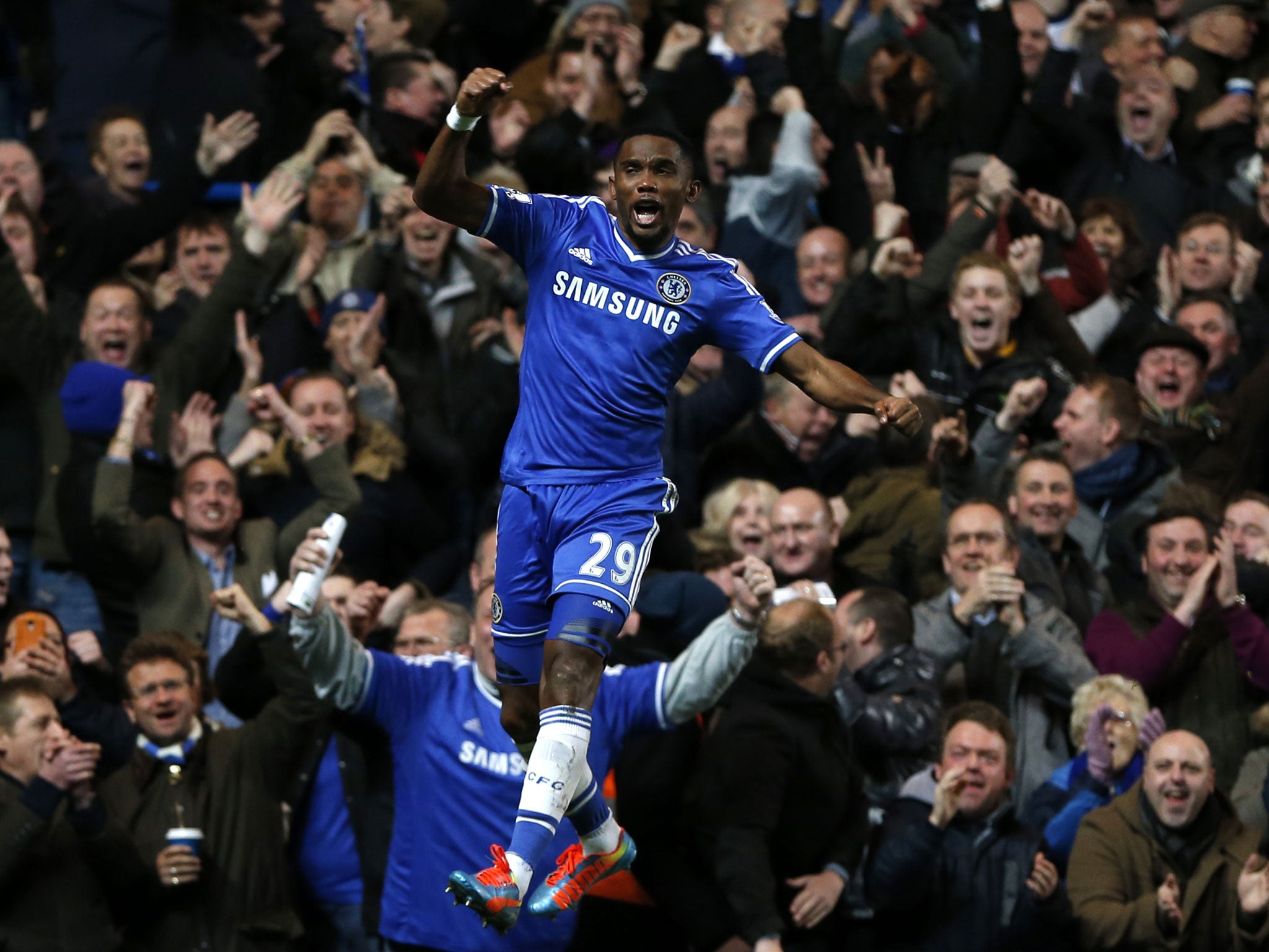 Samuel Eto'o celebrates his third goal against Manchester United