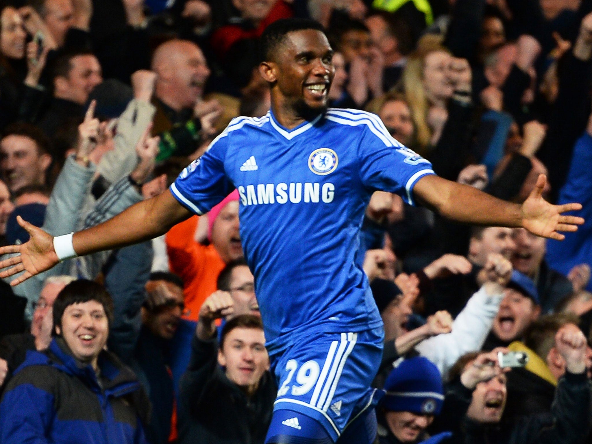 Samuel Eto'o celebrates the second of his treble against Manchester United