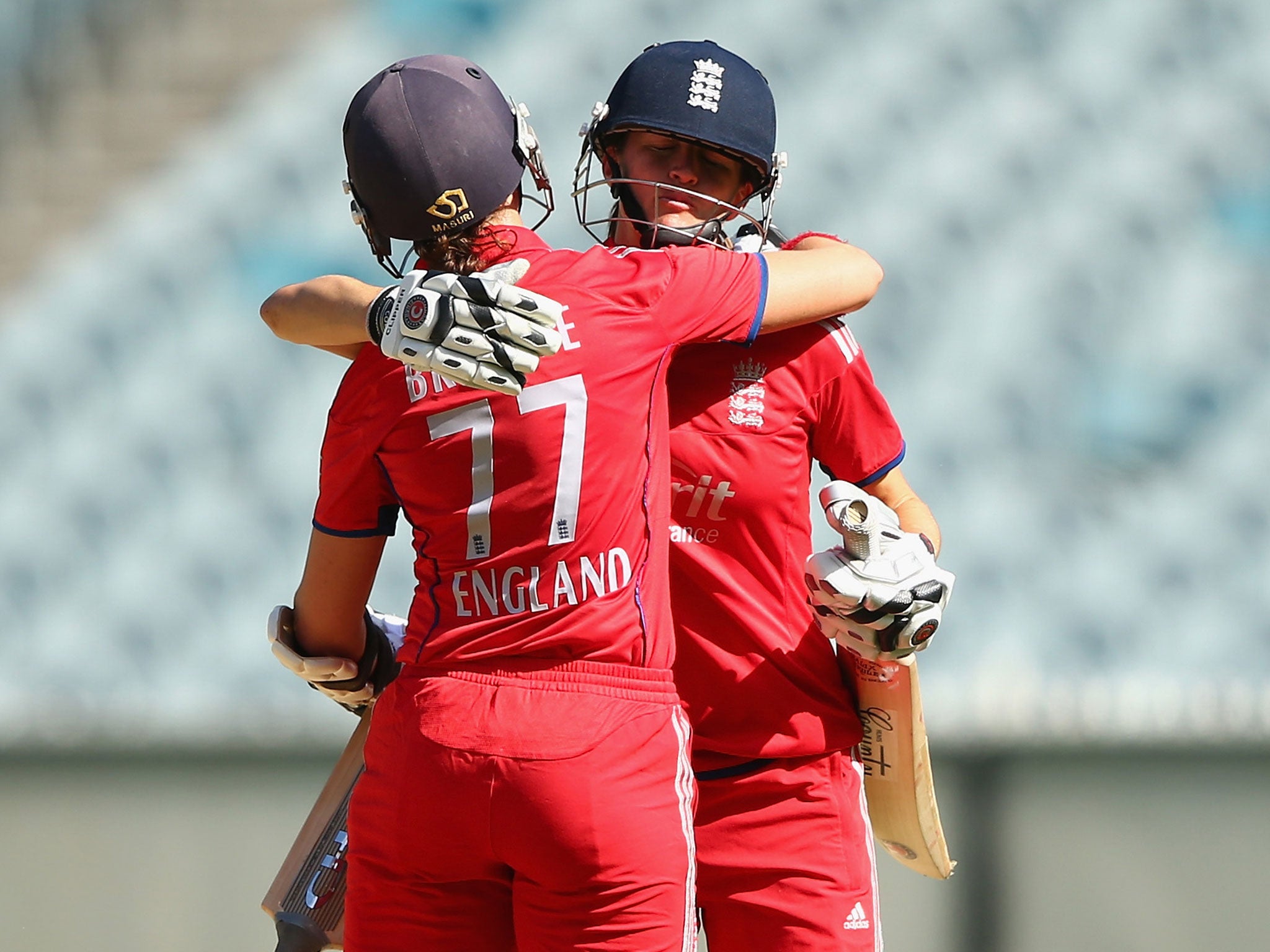 Lydia Greenway, right, and Arran Brindle celebrate the win