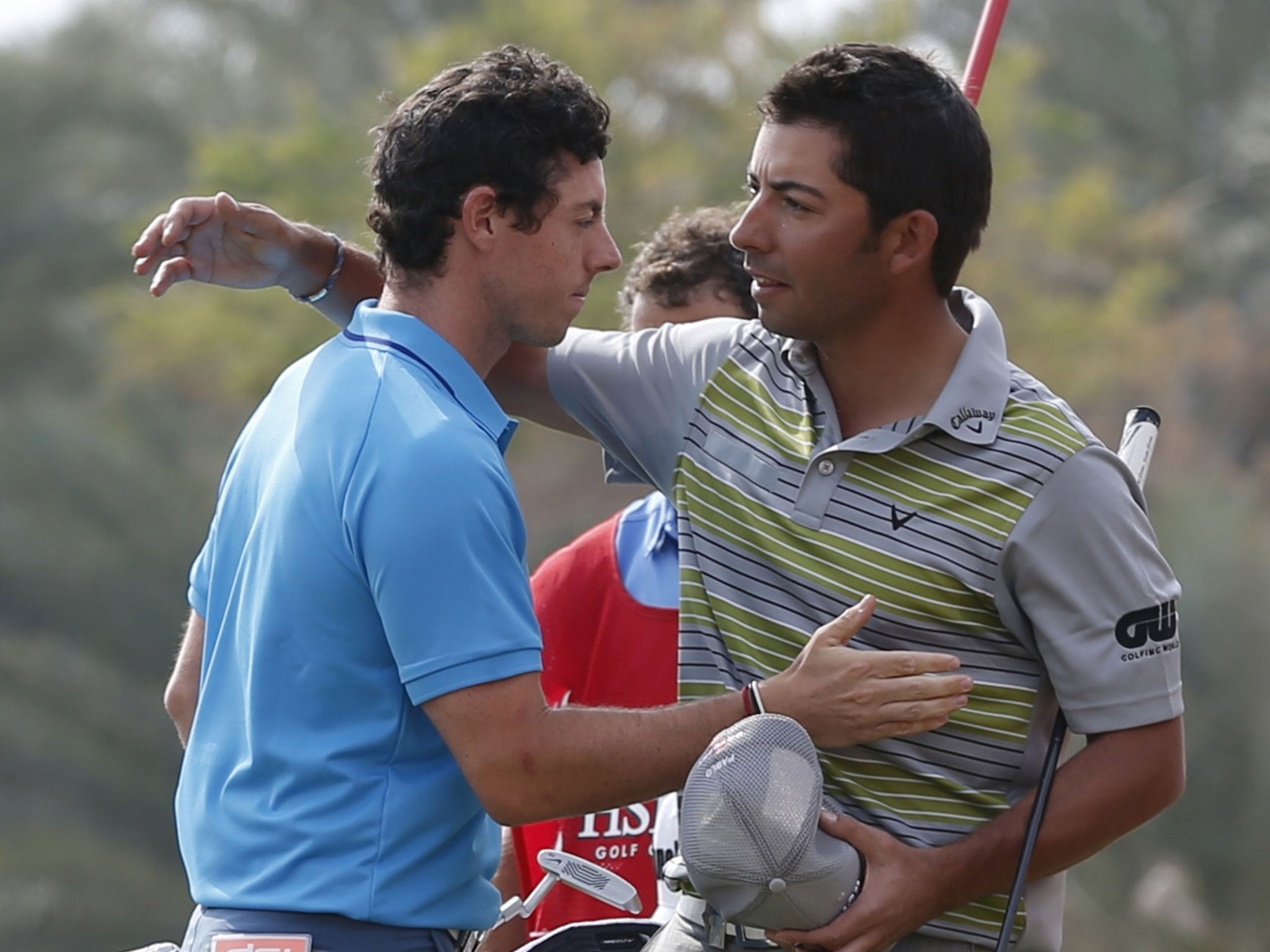 Rory McIlroy, left, congratulates Pablo Larrazabal