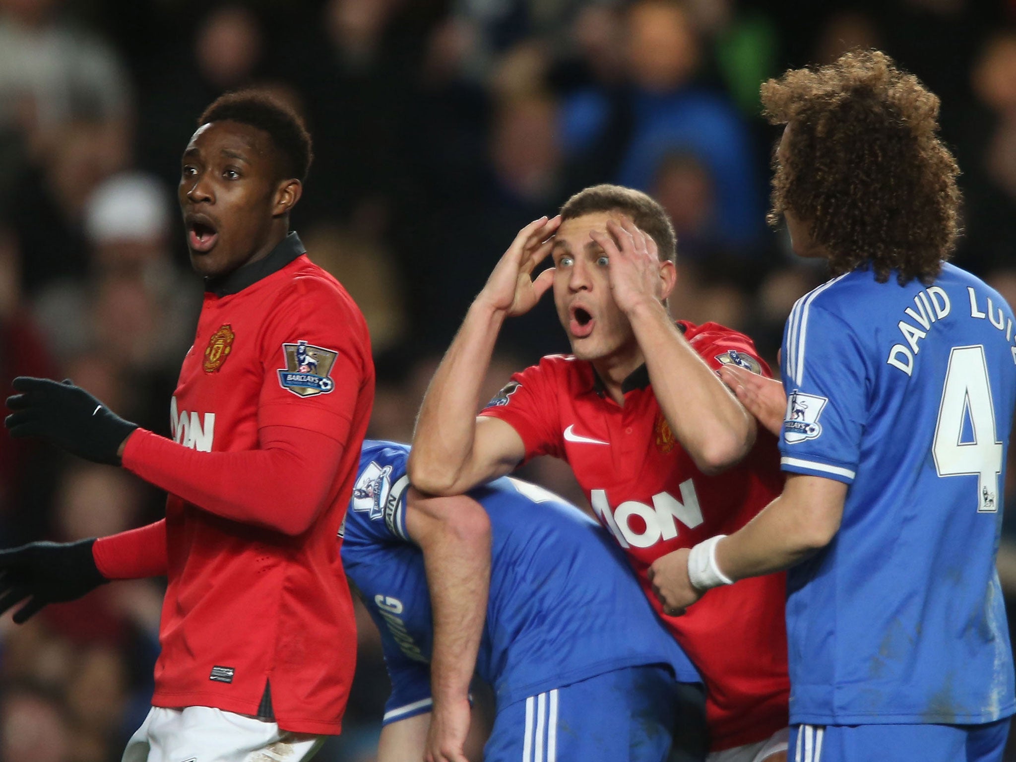 Nemanja Vidic can't believe his red card in the 3-0 defeat to Chelsea