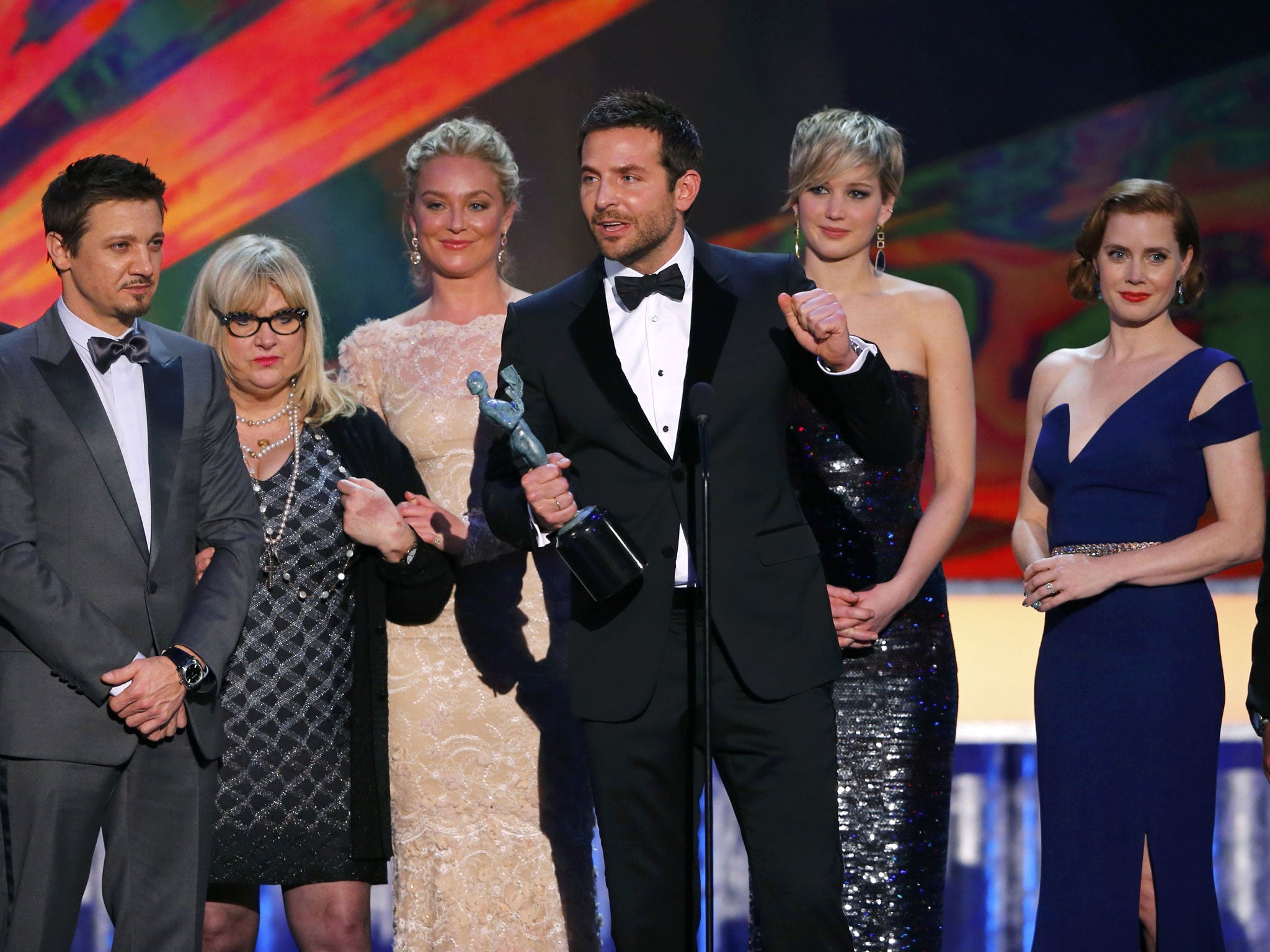 The American Hustle ensemble accept the award for Outstanding Performance by a Cast in a Motion Picture