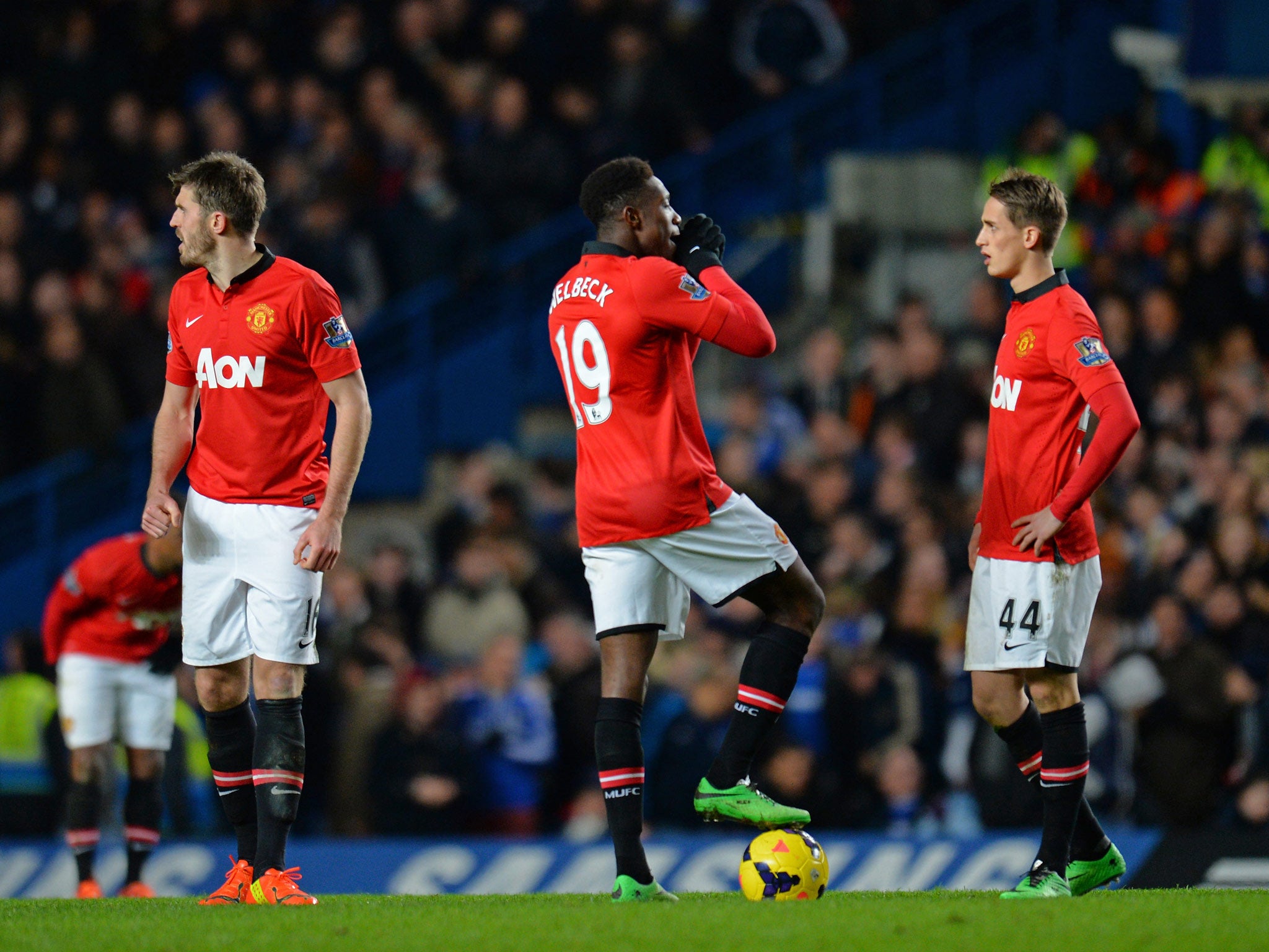 Michael Carrick, Danny Welbeck and Adnan Januzaj of Manchester United look downbeat in the defeat to Chelsea