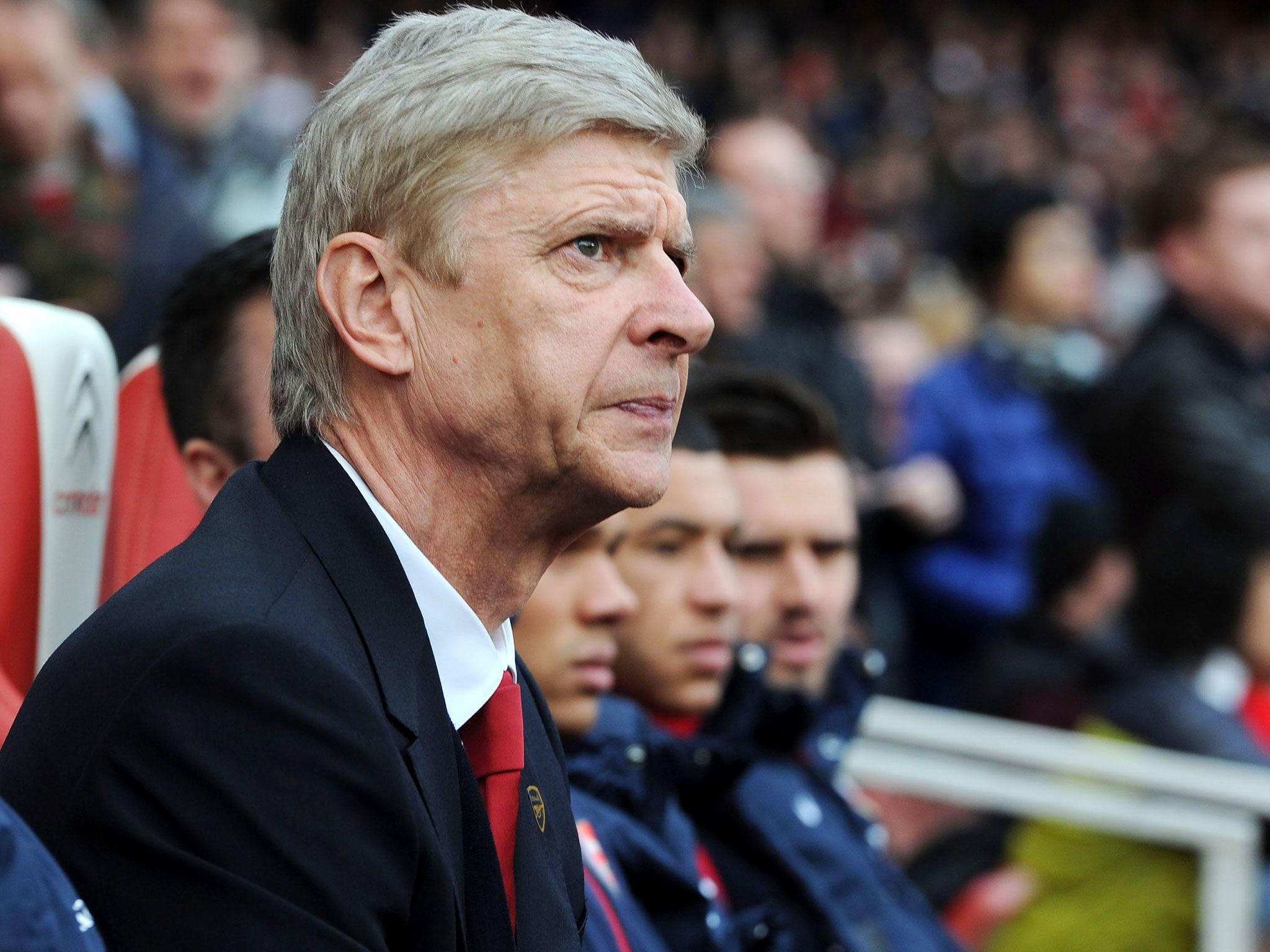 Arsene Wenger looks on from the touchline