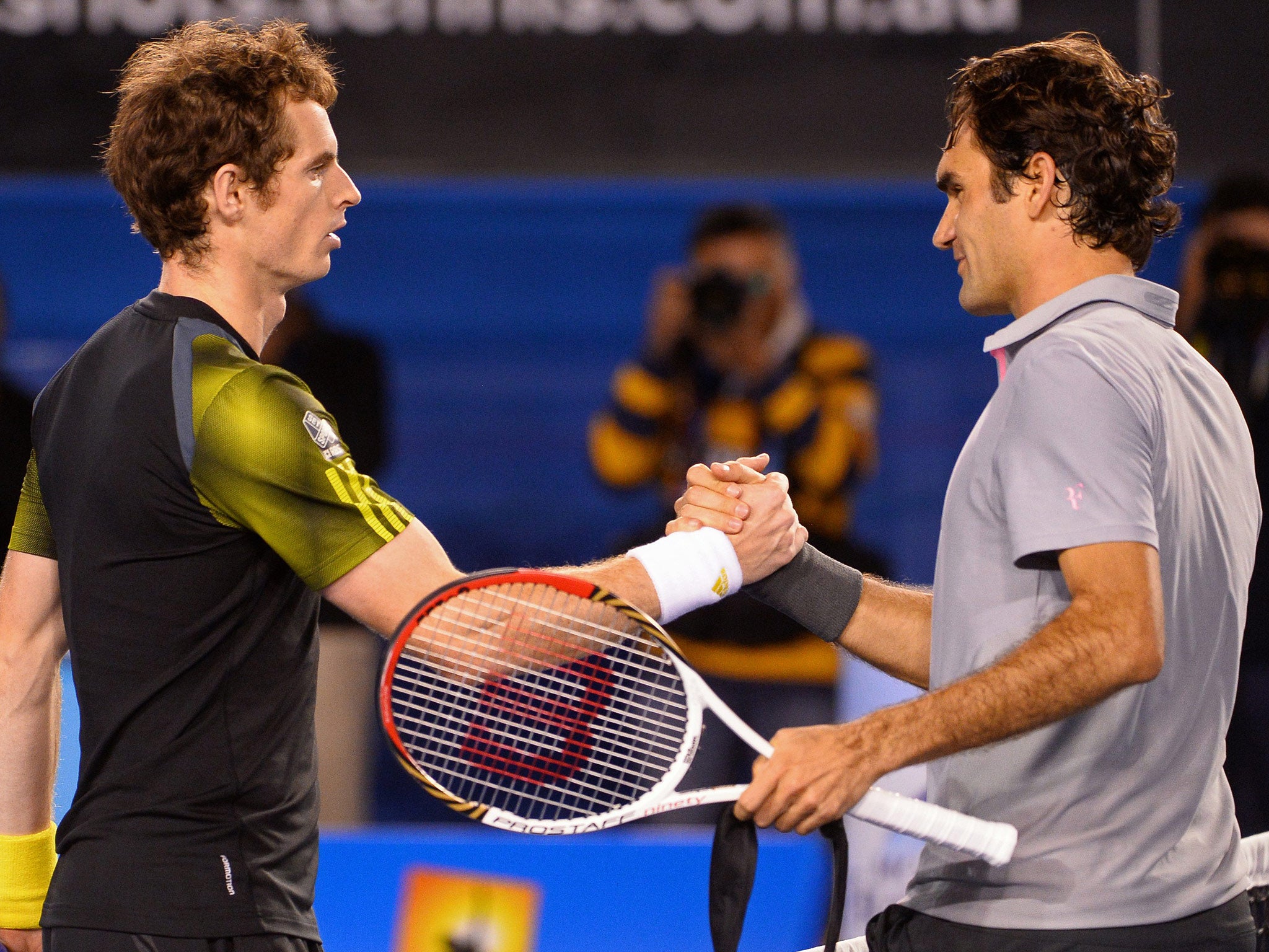 Andy Murray and Roger Federer pictured after their 2013 Australian Open semi-final