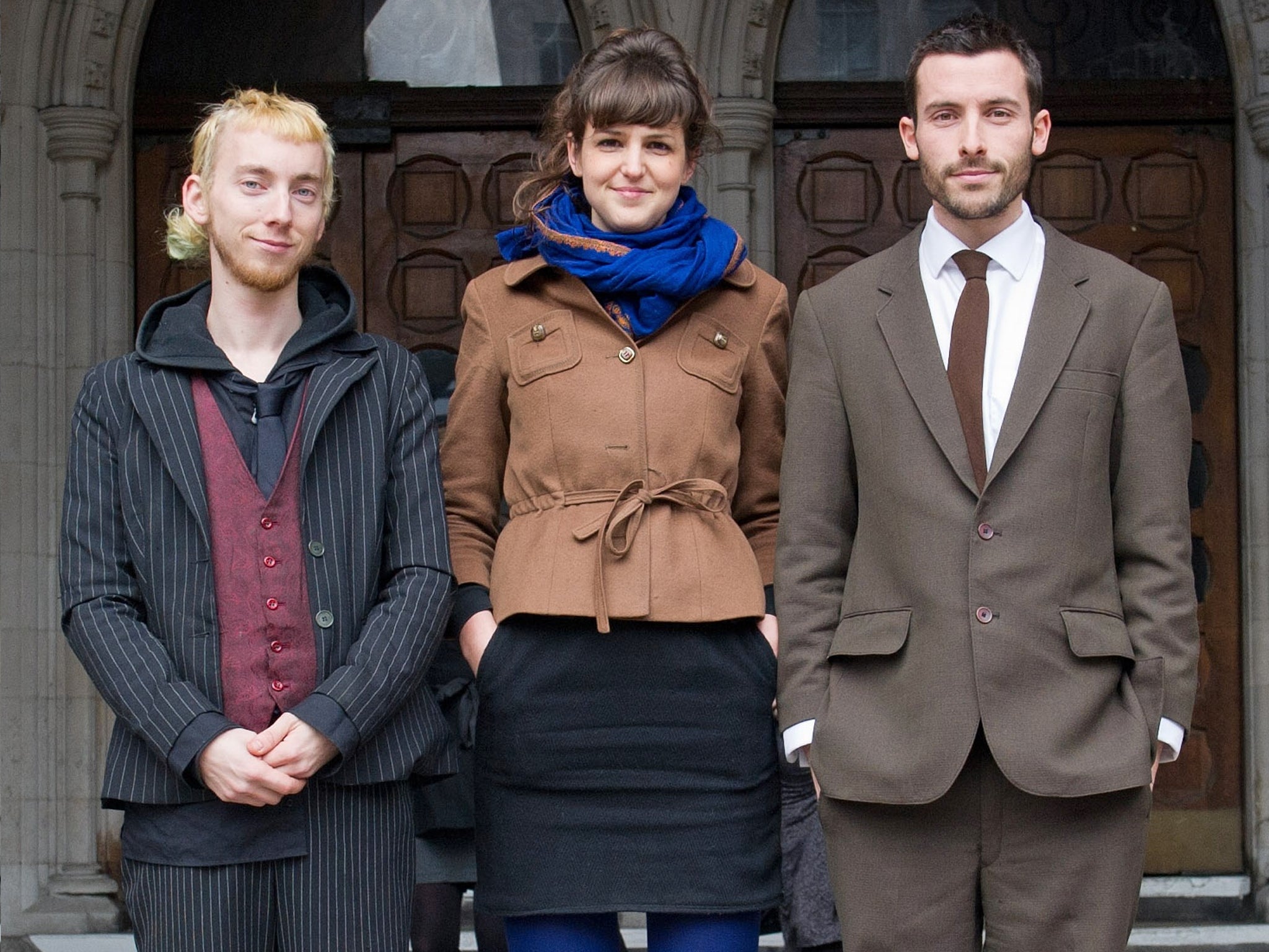 Three of the protesters, Bryn Hoskins, Beth Stratford and Robbie Gillett, outside court