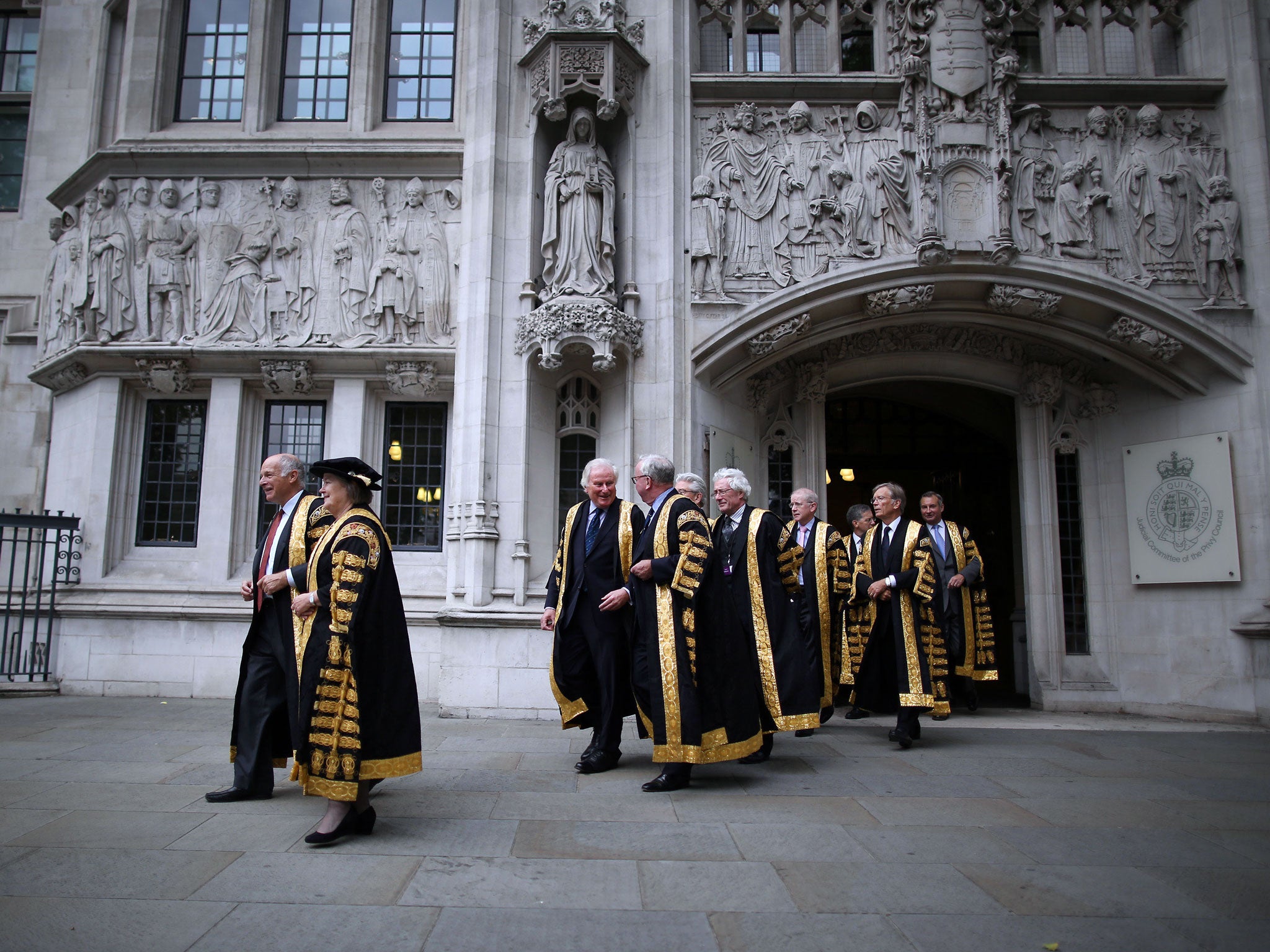 Supreme Court Justices leave the Supreme Court to in London, where a ruling against HS2 objectors was made on Wednesday