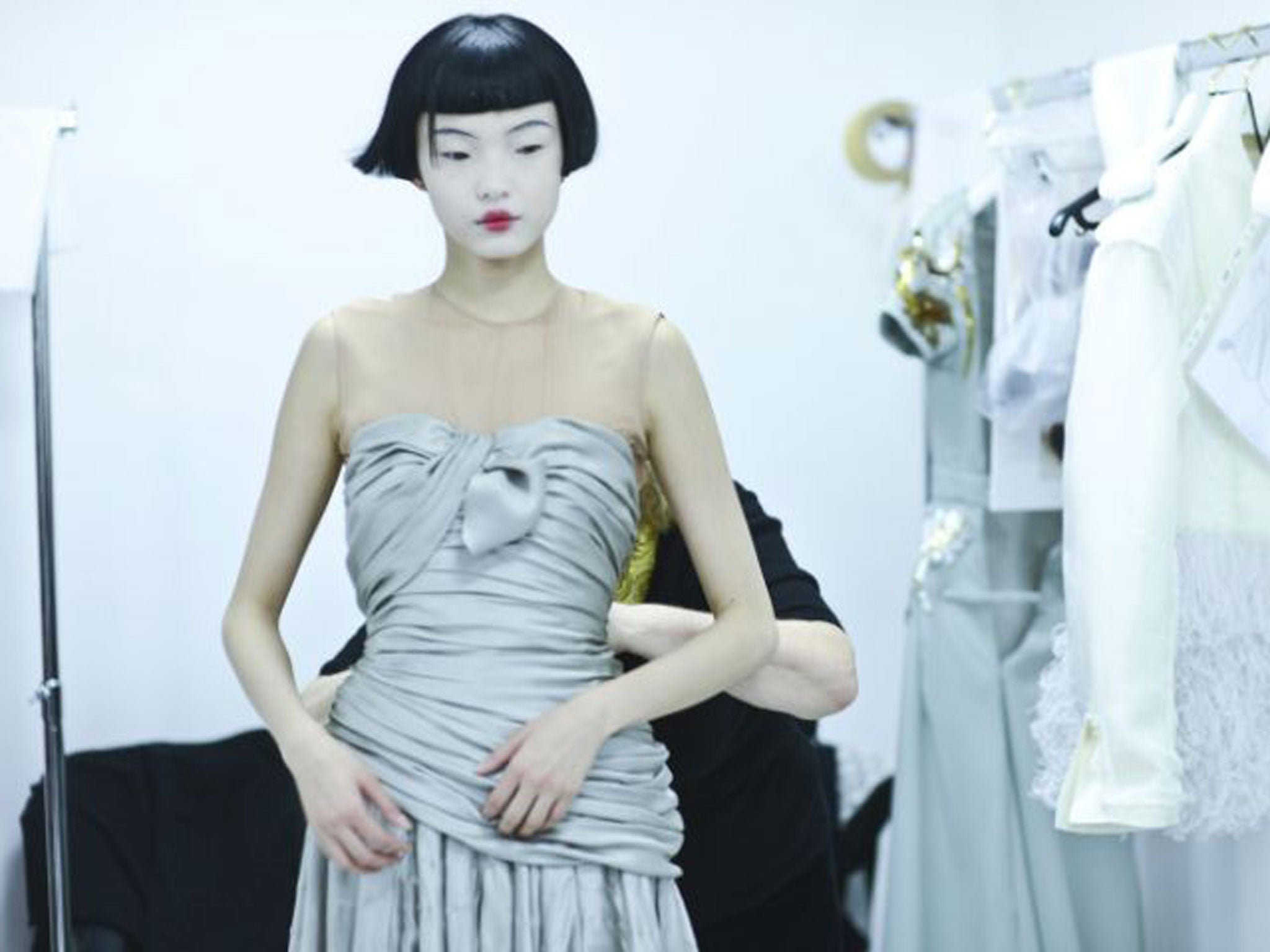 A model backstage at Schiaparelli's Paris show