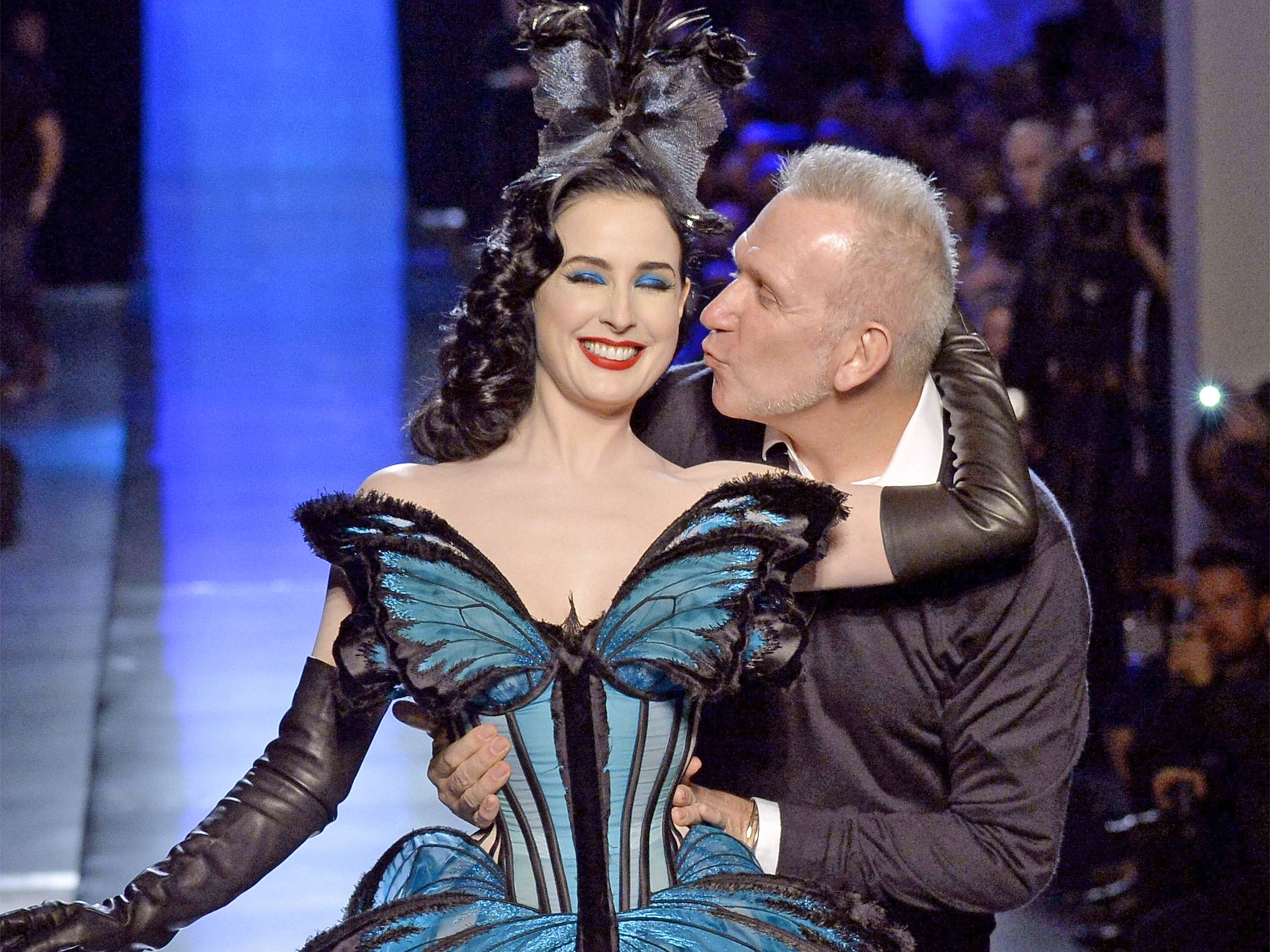 Model and burlesque dancer Dita Von Teese gets a kiss from Jean-Paul Gaultier