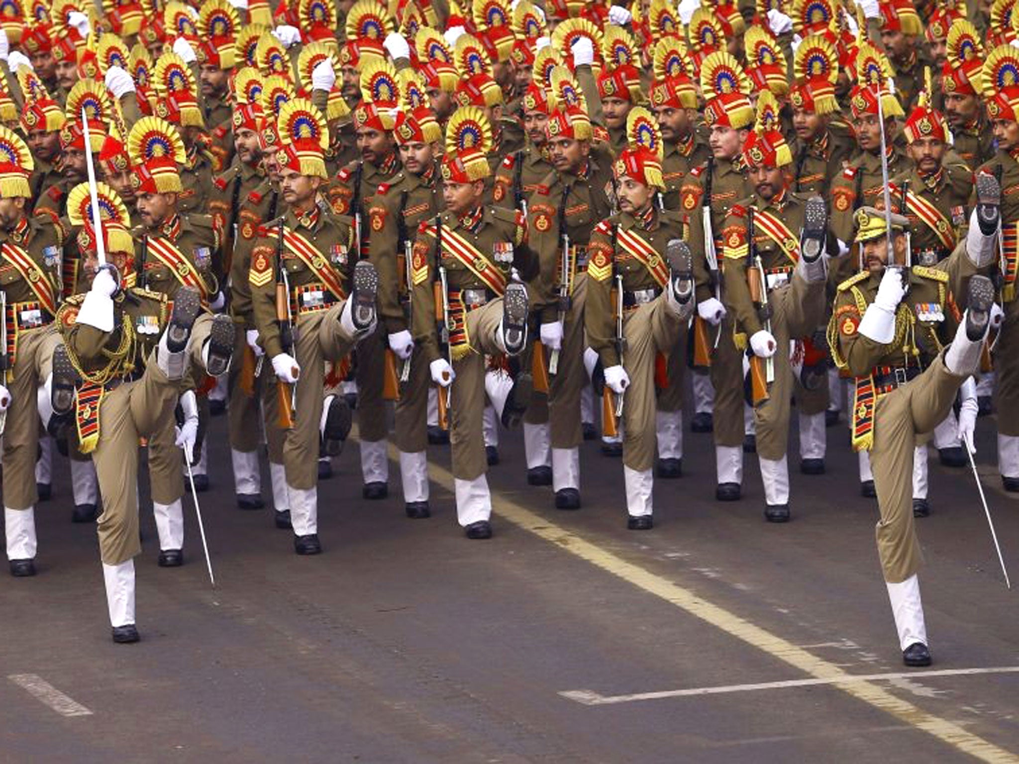 Indian paramilitary soldiers march during full dress rehearsals for the Republic Day parade, in New Delhi