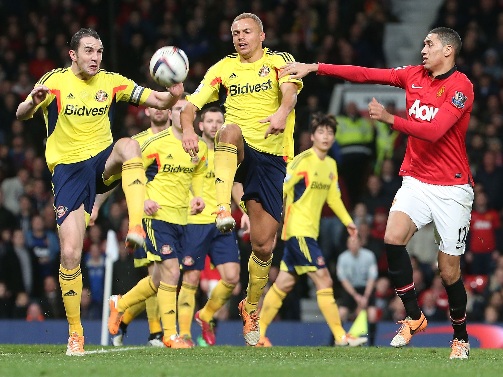 Wes Brown attempts to clear the ball for Sunderland during the League Cup semi-final against Manchester United