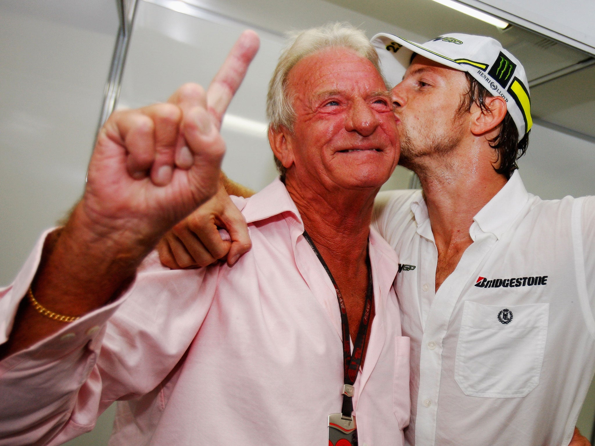 Button, left, with Jenson in Brazil after his son had won the 2009 F1 world title