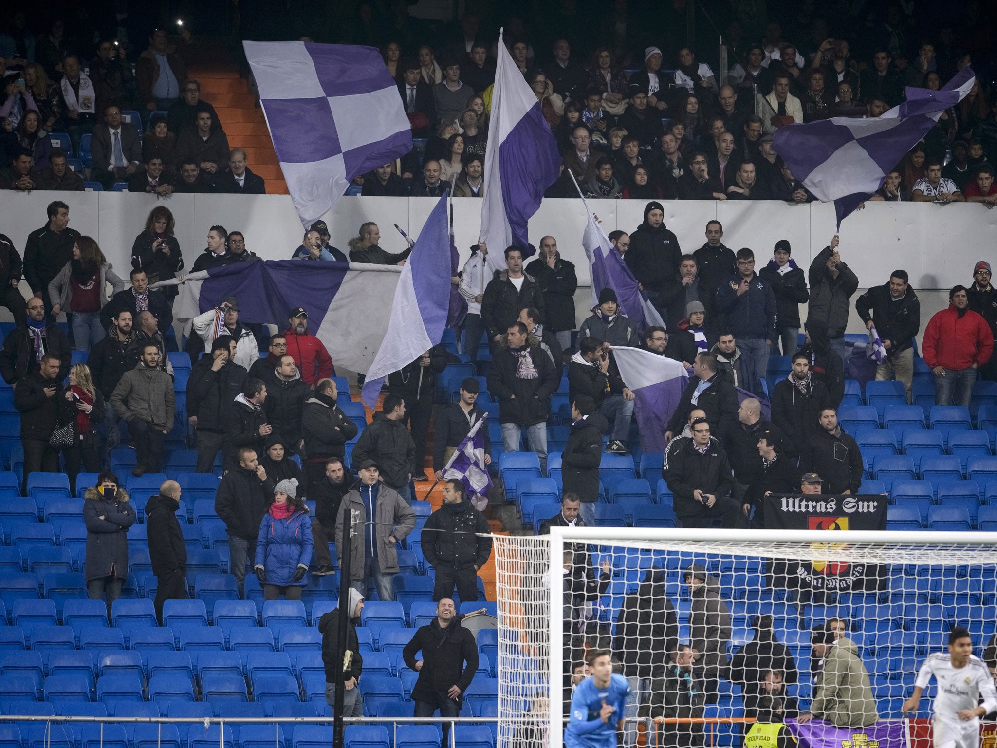 Empty seats behind the goal during the Copa del Rey encounter between Real Madrid and Olímpic de Xativa last month