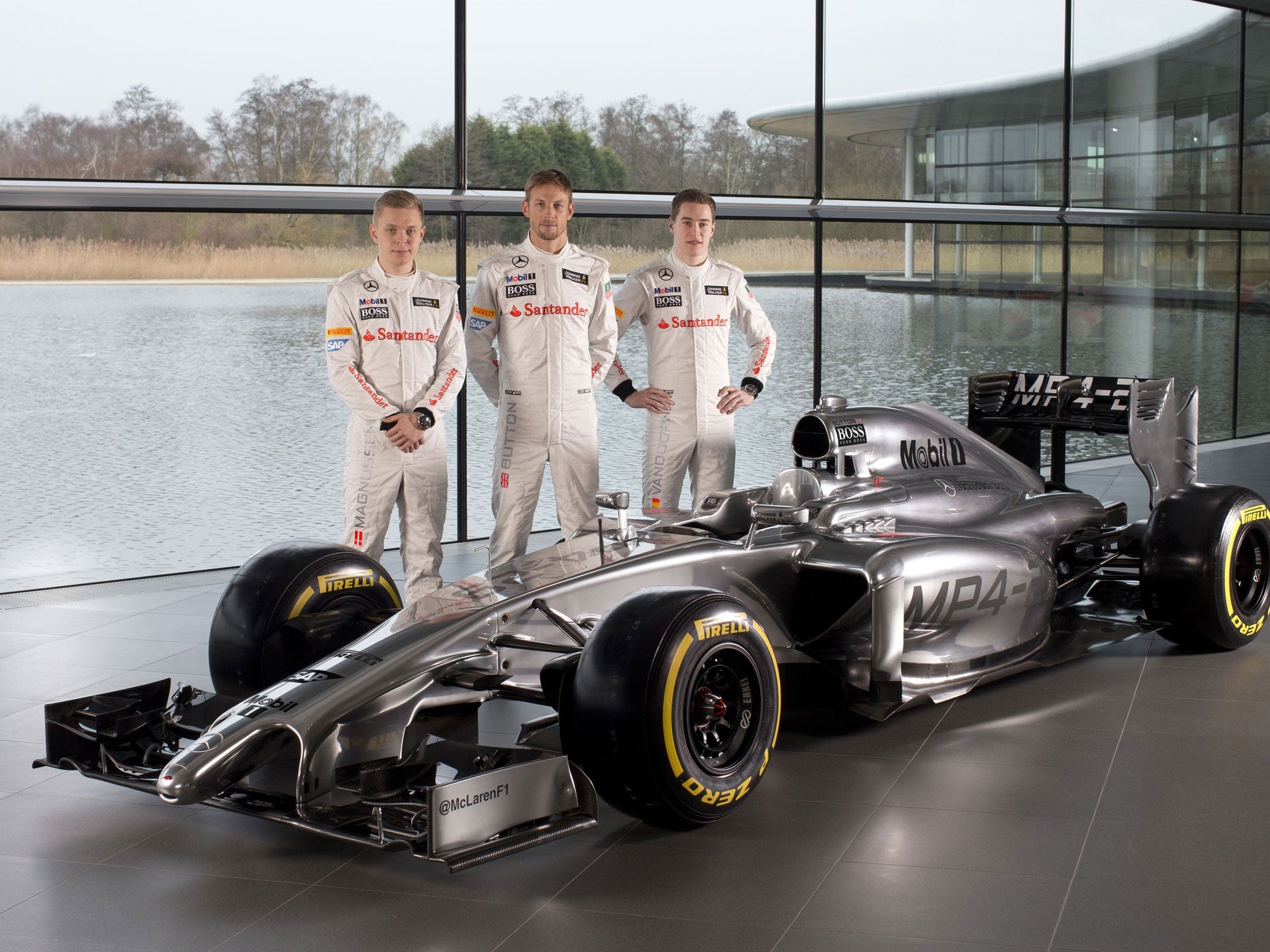 McLaren drivers (left to right) Kevin Magnussen, Jenson Button and Stoffel Vandoorne at the launch of the new MP4-29 car at their base in Woking