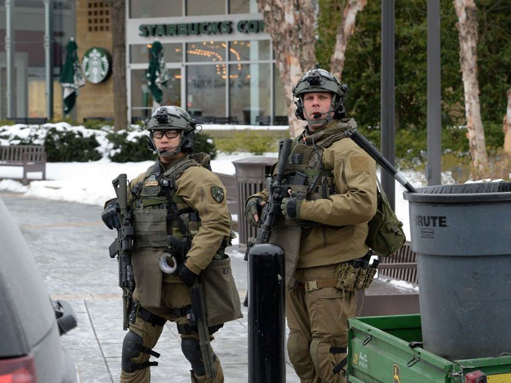 Officers patrol outside the Columbia Mall after a fatal shooting