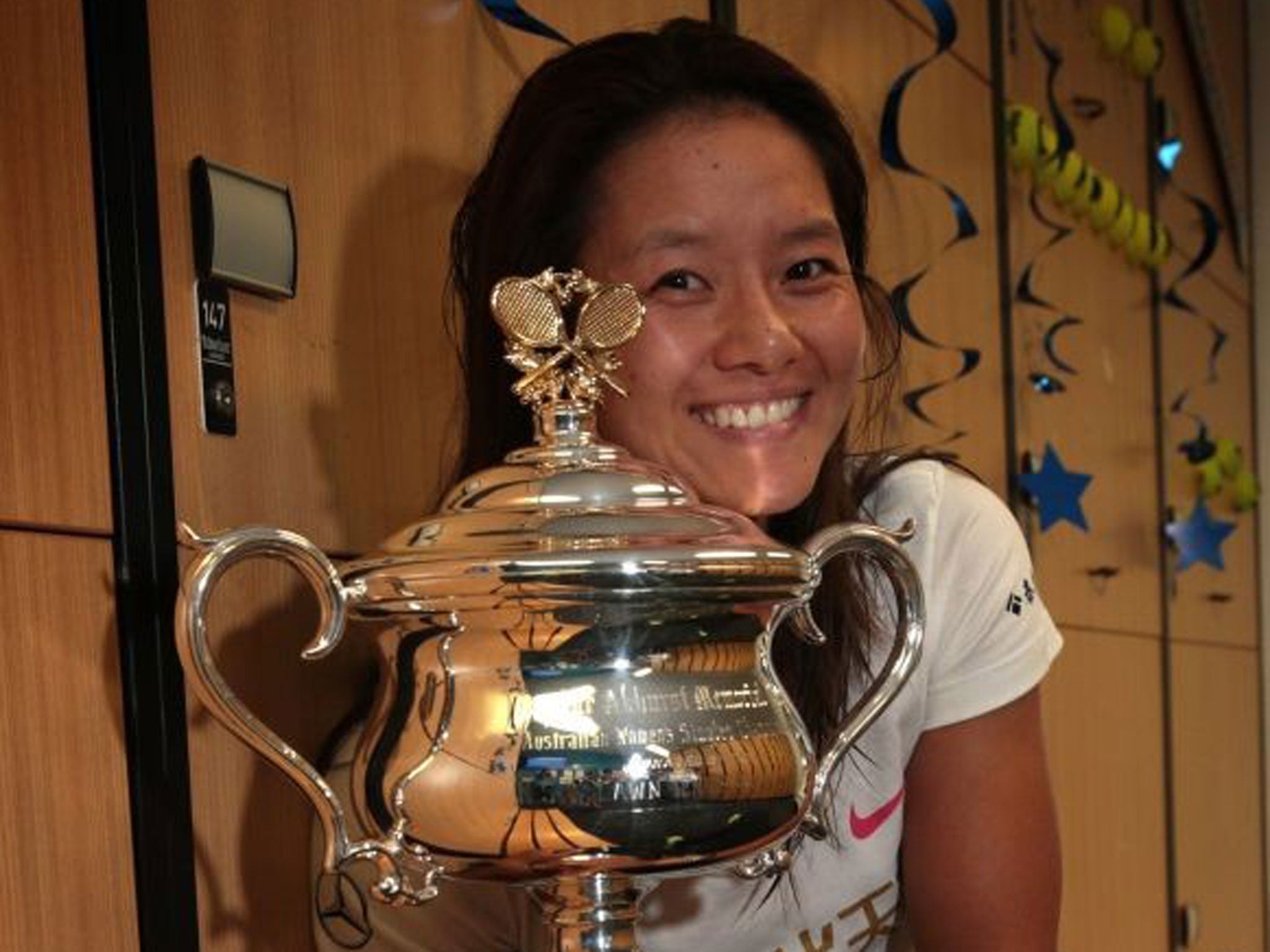 All smiles: China’s Li Na celebrates with her second Grand Slam trophy