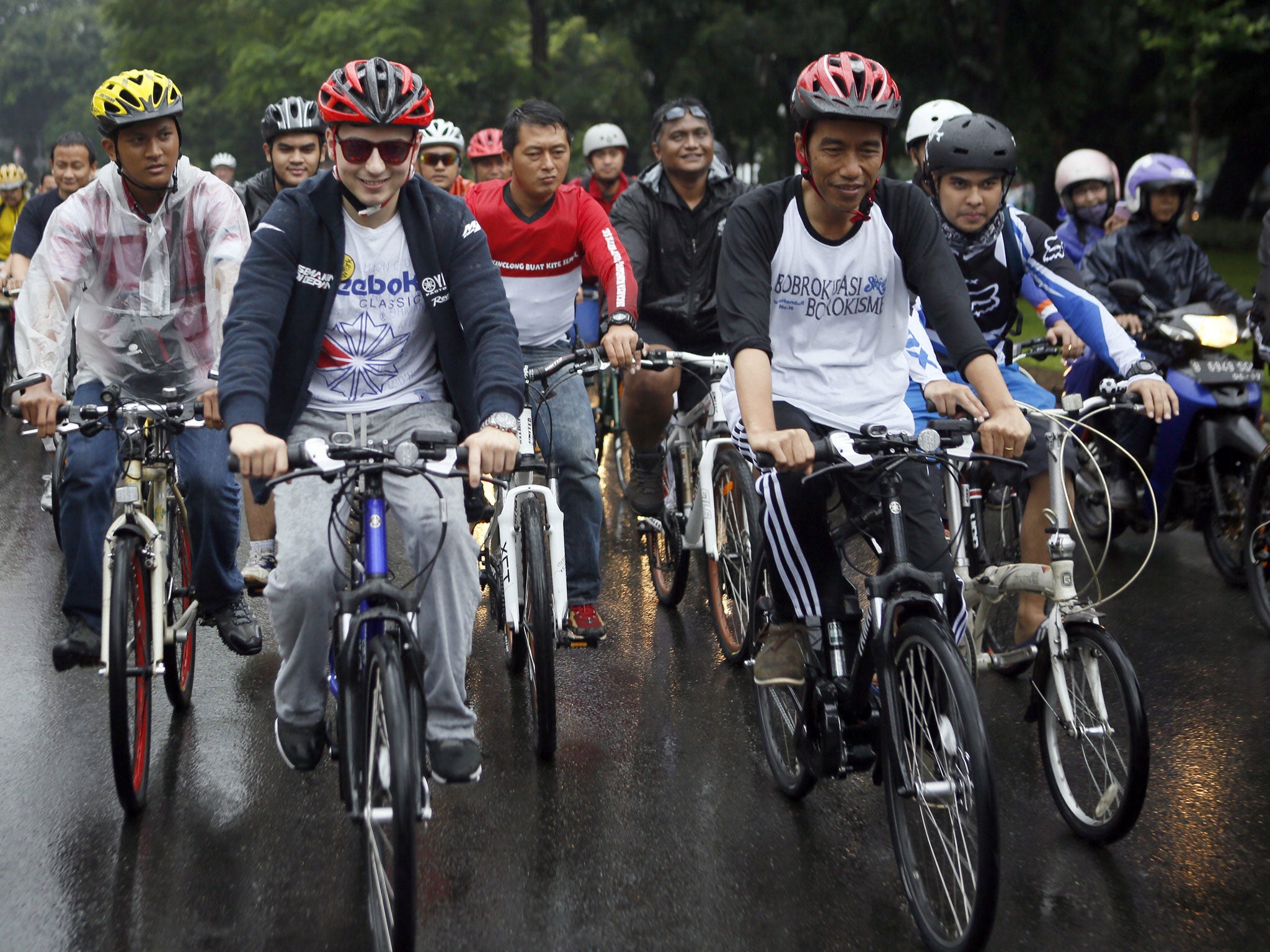 Jakarta's governor, Joko Widodo, (front right) this month