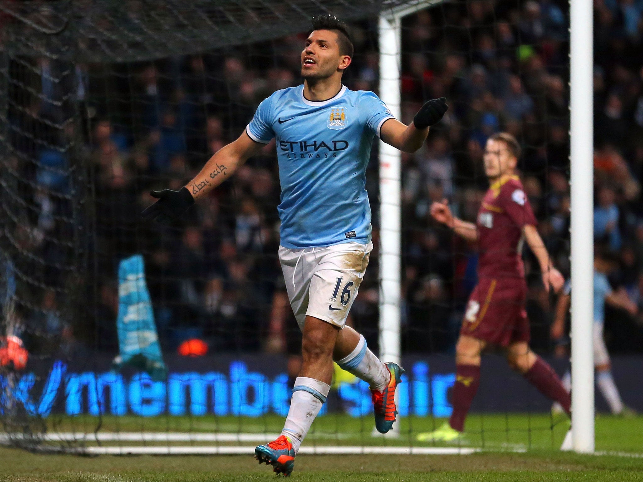 Sergio Aguero celebrates one of his goals in a second-half hat-trick