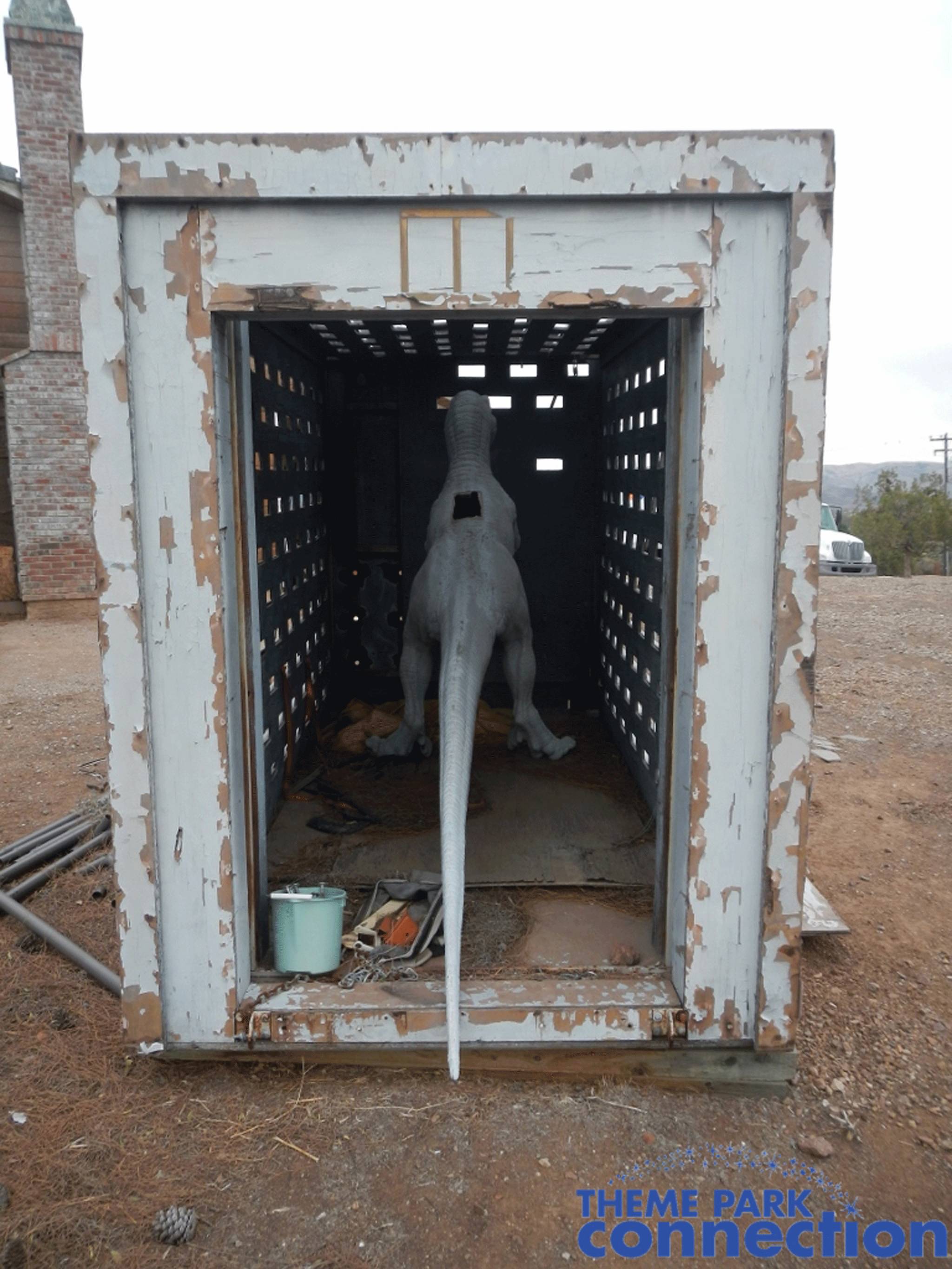 A fake Velociraptor comes with the cage (Picture: eBay)