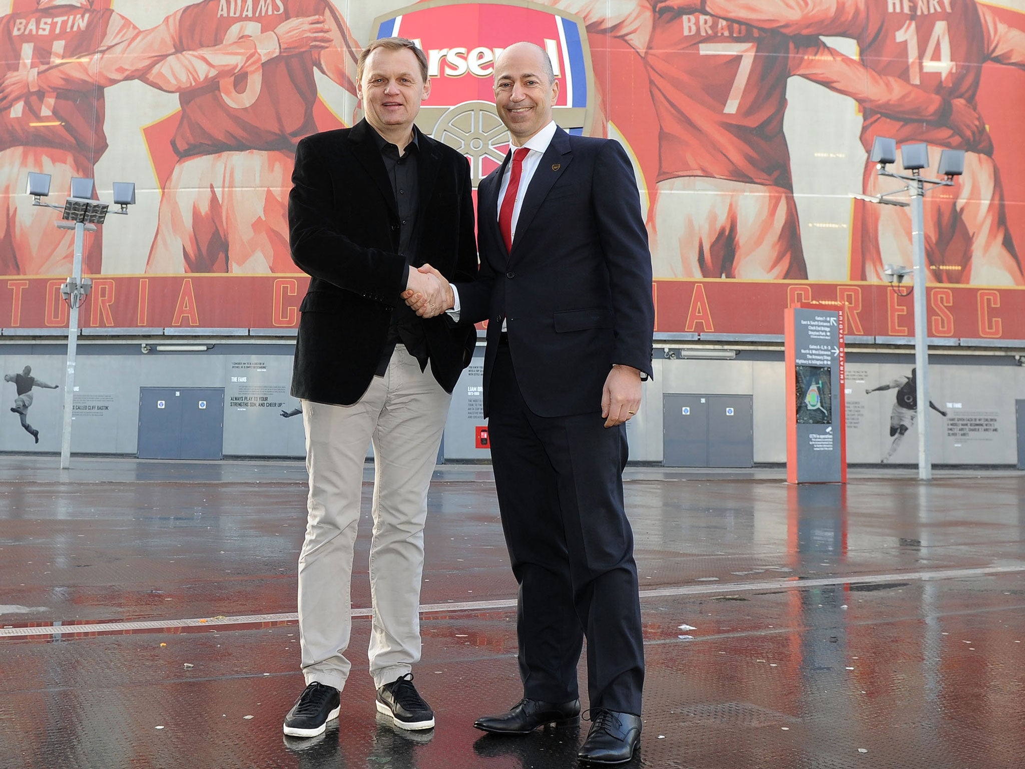 Ivan Gazidis the Arsenal CEO shakes the hand of Bjoern Gulden the CEO of Puma at Emirates Stadium on Monday