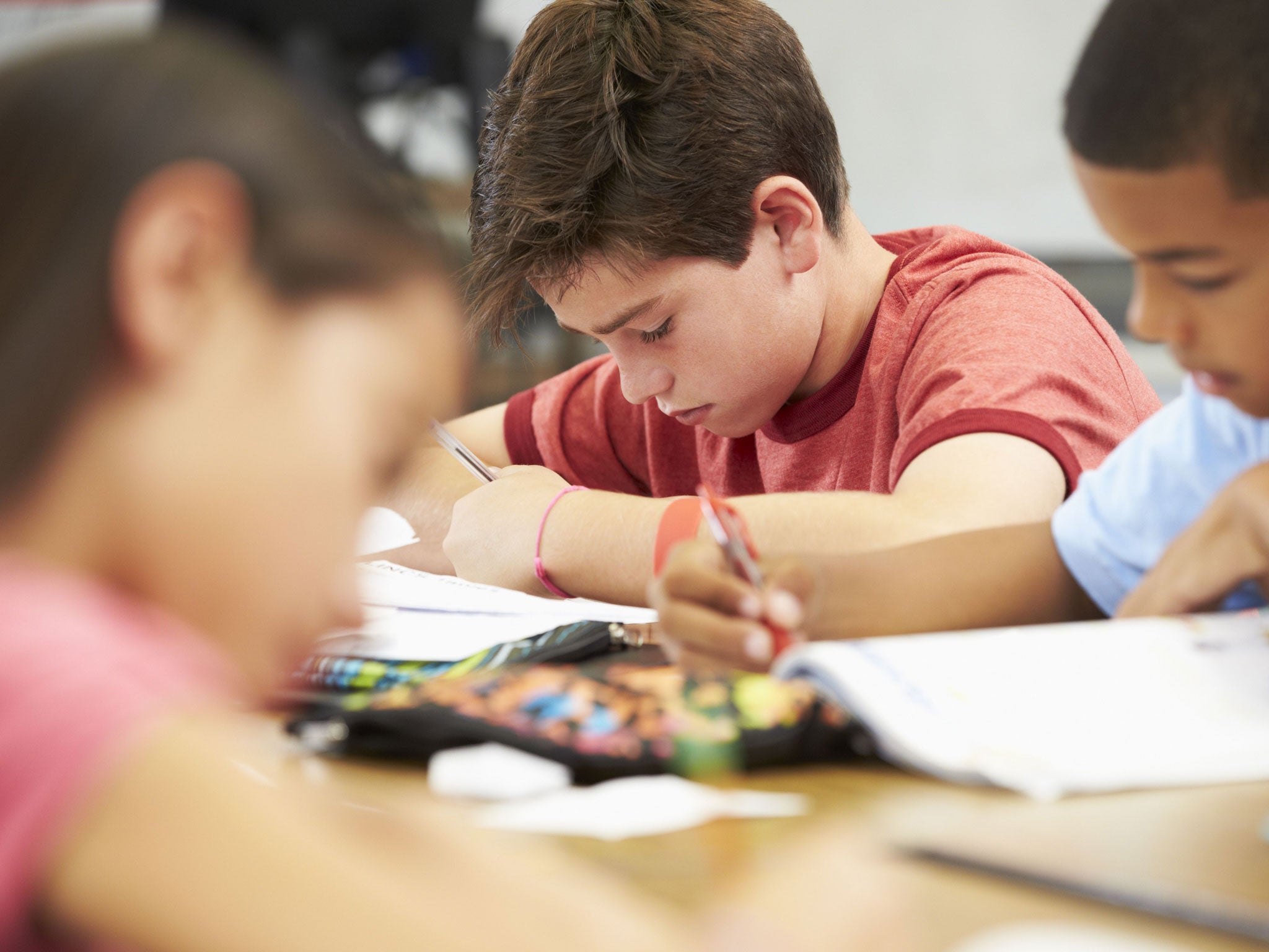 Dr Andrew Davis claims rival camps in the debate over how to teach children to read are acting like 'religious fundamentalists'