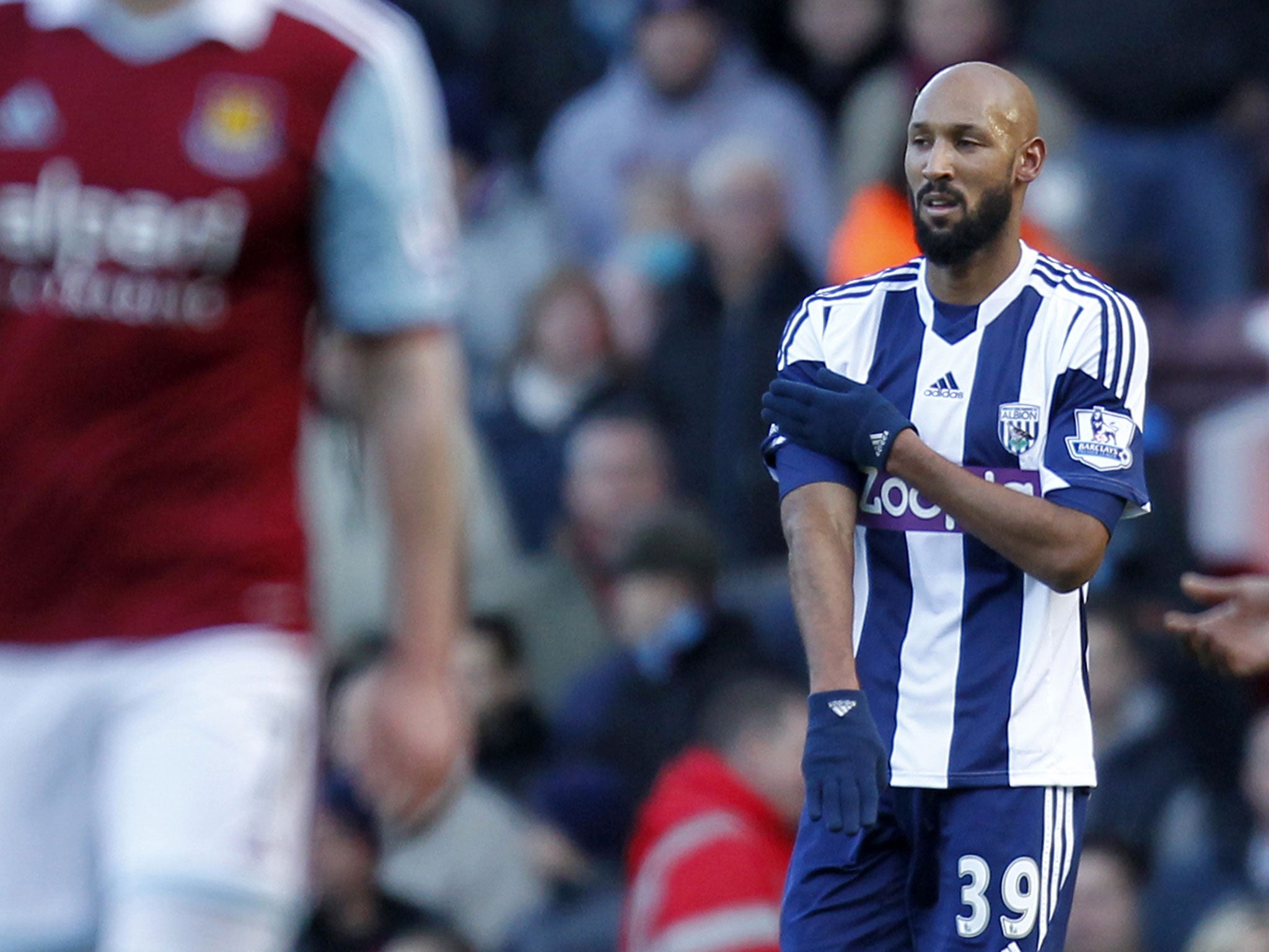 West Bromwich Albion's French striker Nicolas Anelka gestures as he celebrates scoring their second goal against West Ham United