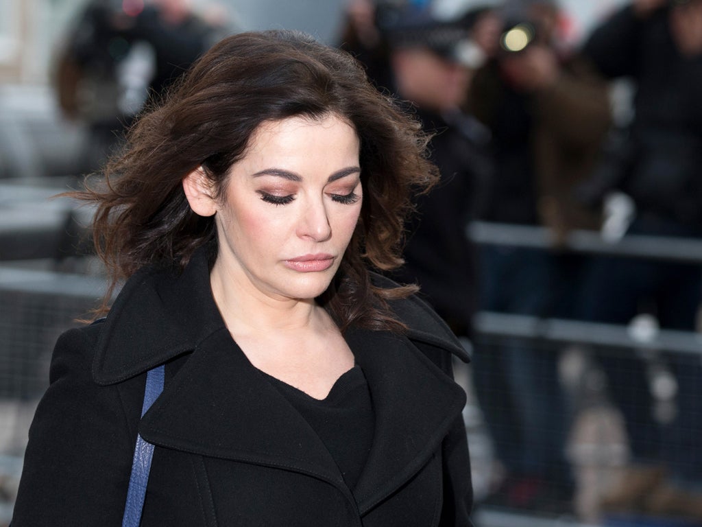 Nigella Lawson arrives at Isleworth Crown Court on December 5, 2013 in London, England. Italian sisters Francesca and Elisabetta Grillo, who worked as assistants to Nigella Lawson and Charles Saatchi, are accused of defrauding them of over 300,000 GBP.