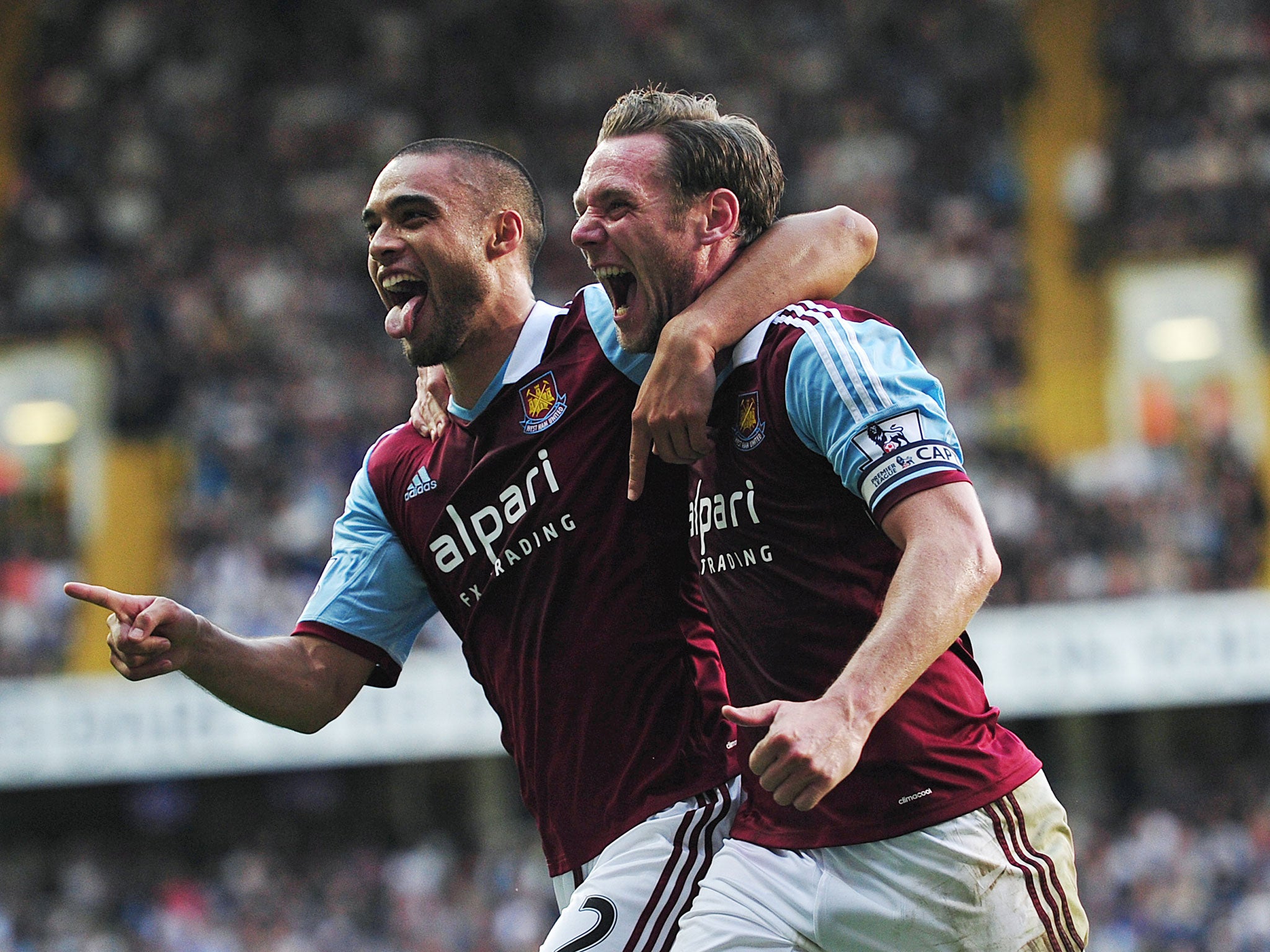 Winston Reid celebrates his goal with Kevin Nolan