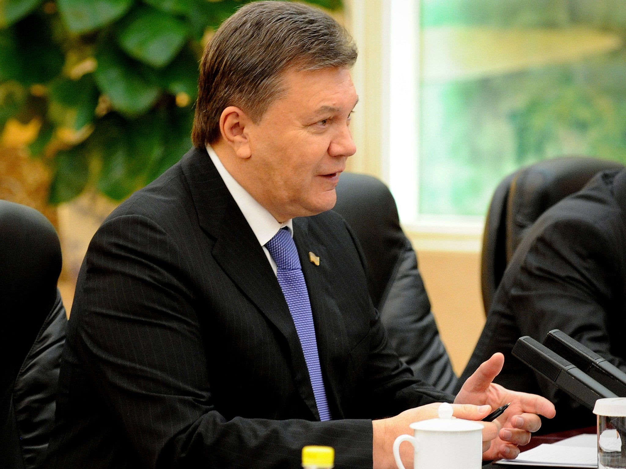 Ukrainian President Viktor Yanukovych, above, accepted Mykola Azarov's resignation (Getty)