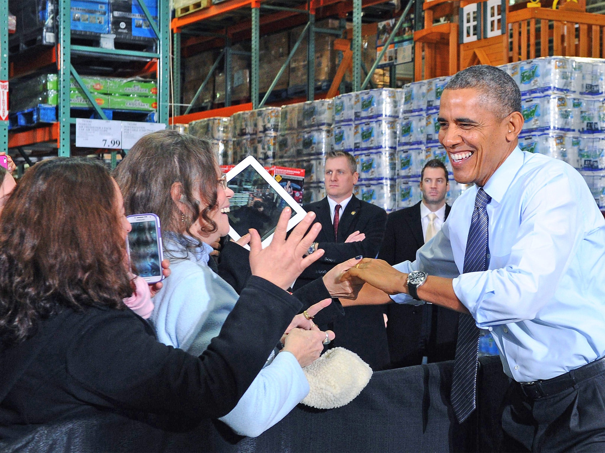 Barack Obama told a crowd at a Costco store the country was moving on