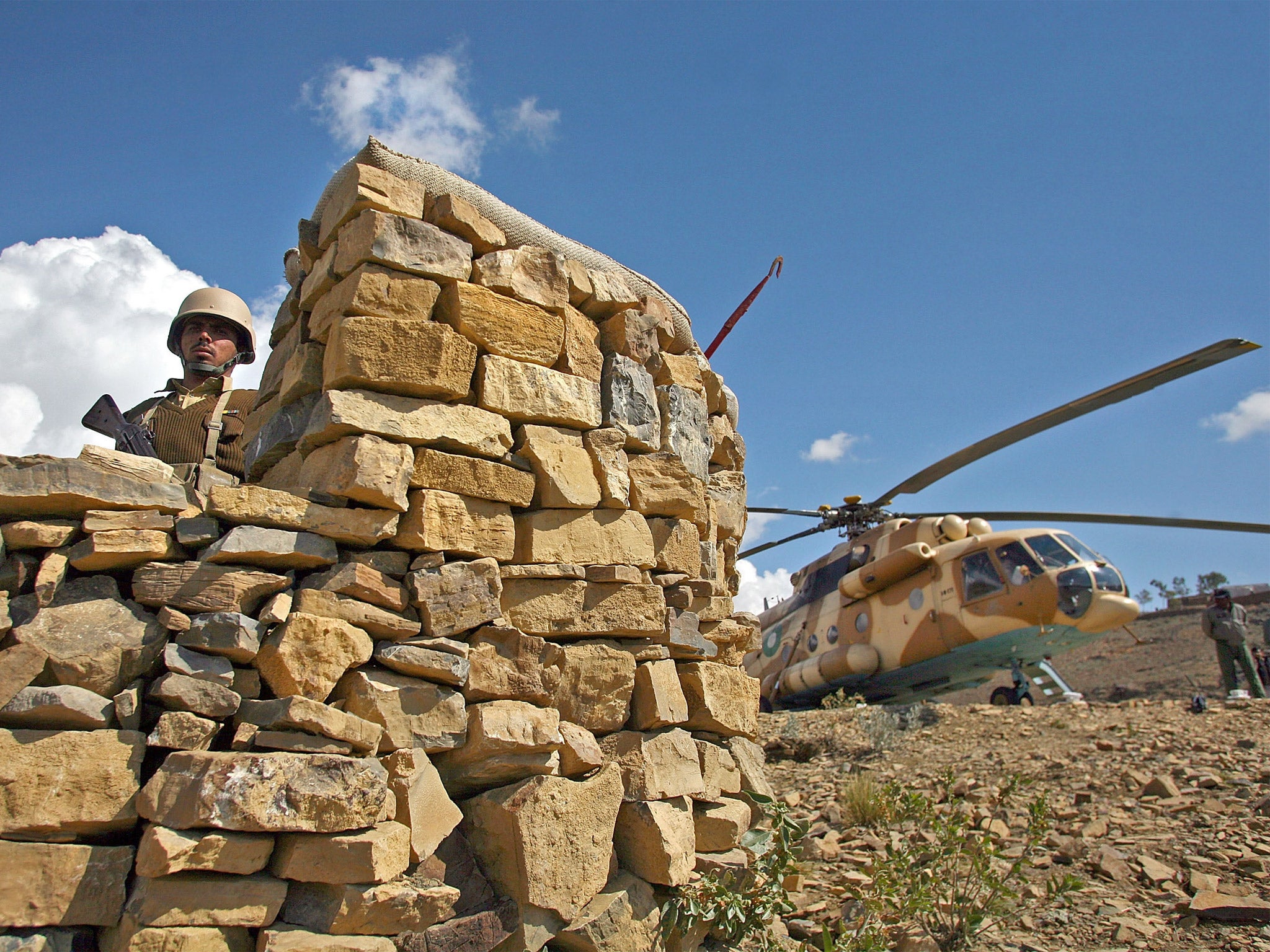 A Pakistani soldier mans a bunker at a combat outpost in North Waziristan (Getty)