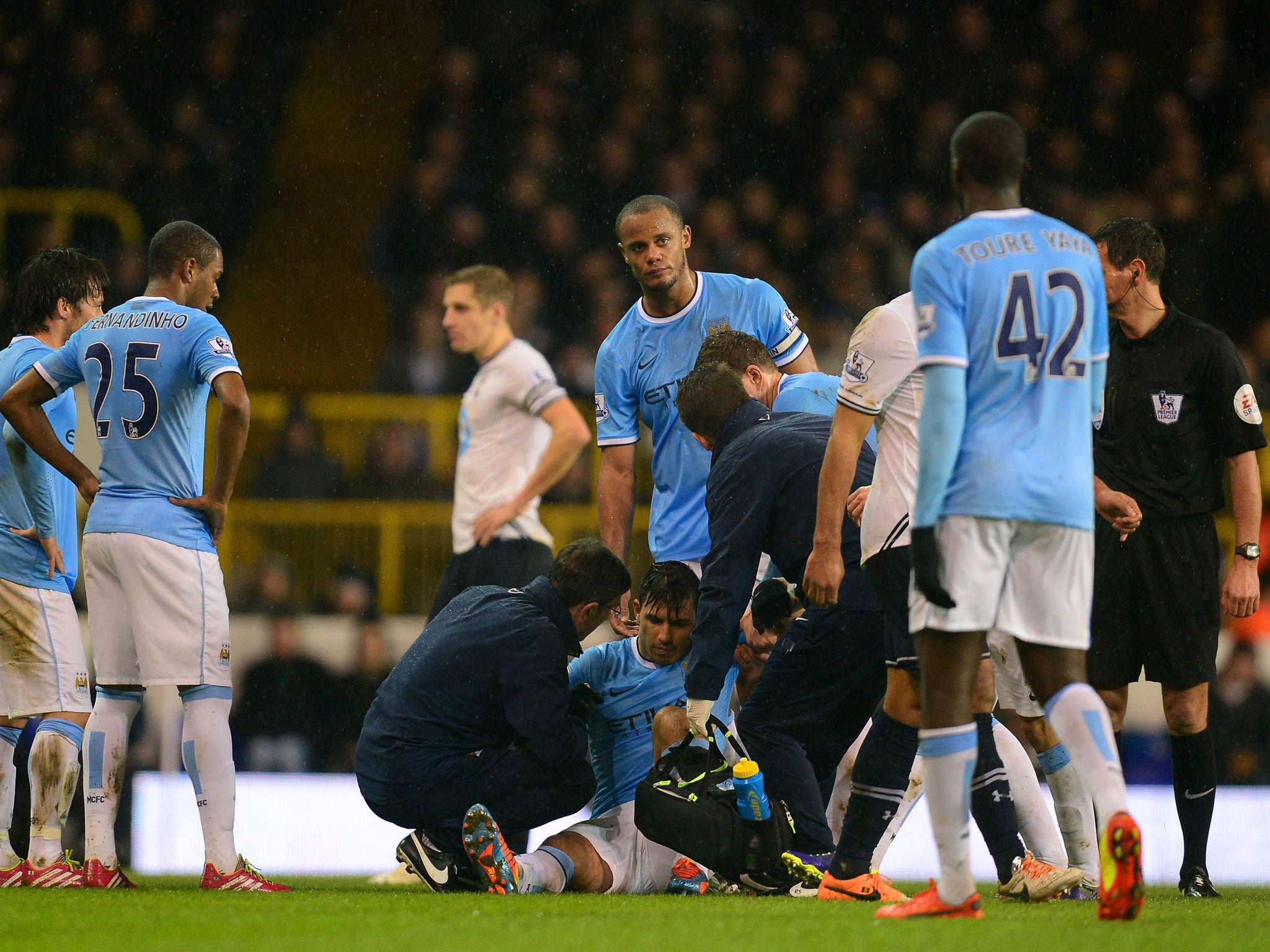 Sergio Aguero receives treatment on a hamstring injury during Manchester City's 5-1 win over Tottenham