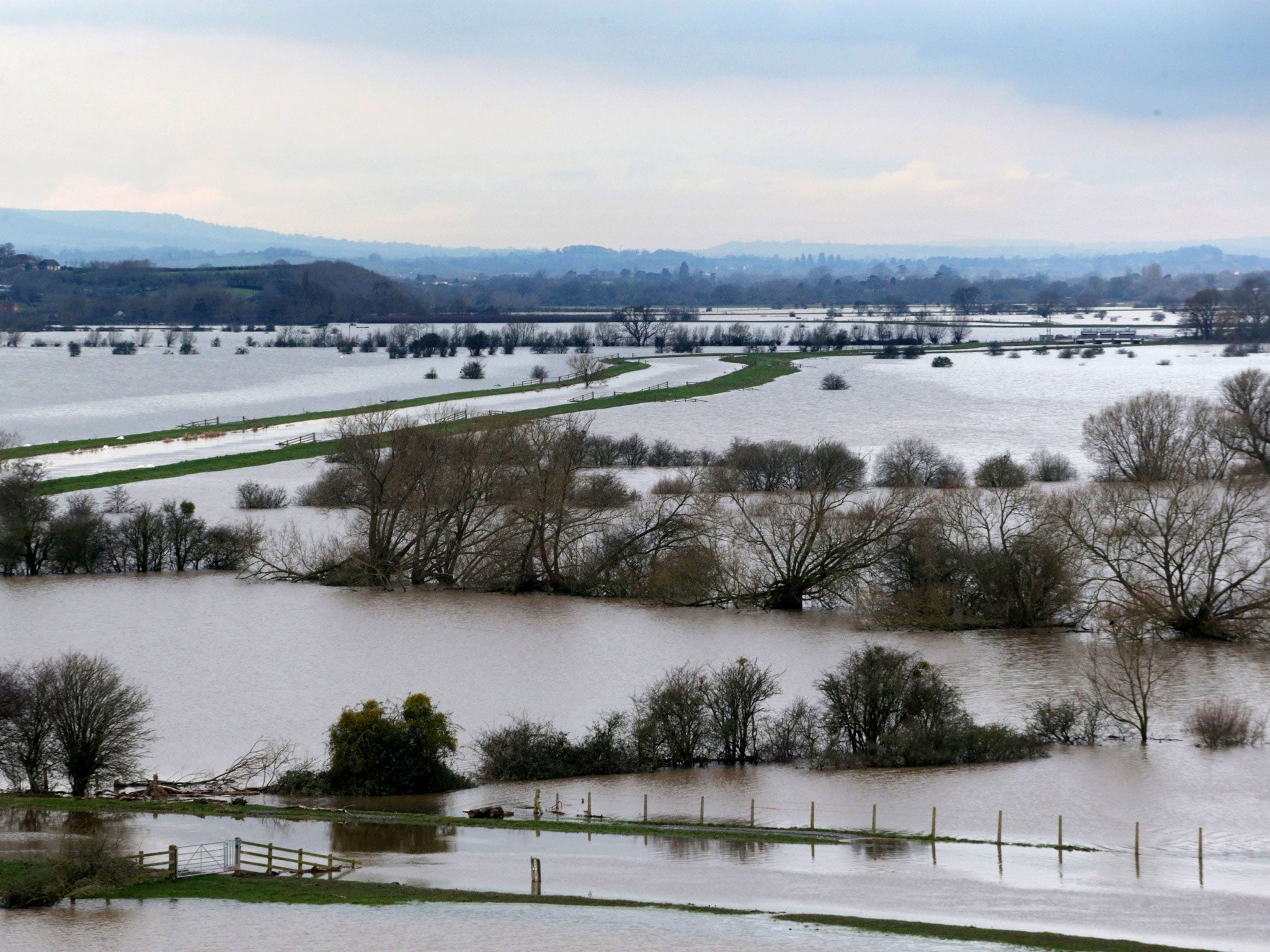 Flooded fields surround the River Tone near Langport in Somerset, England, on 29 January. The military has been brought in to provide relief to villages