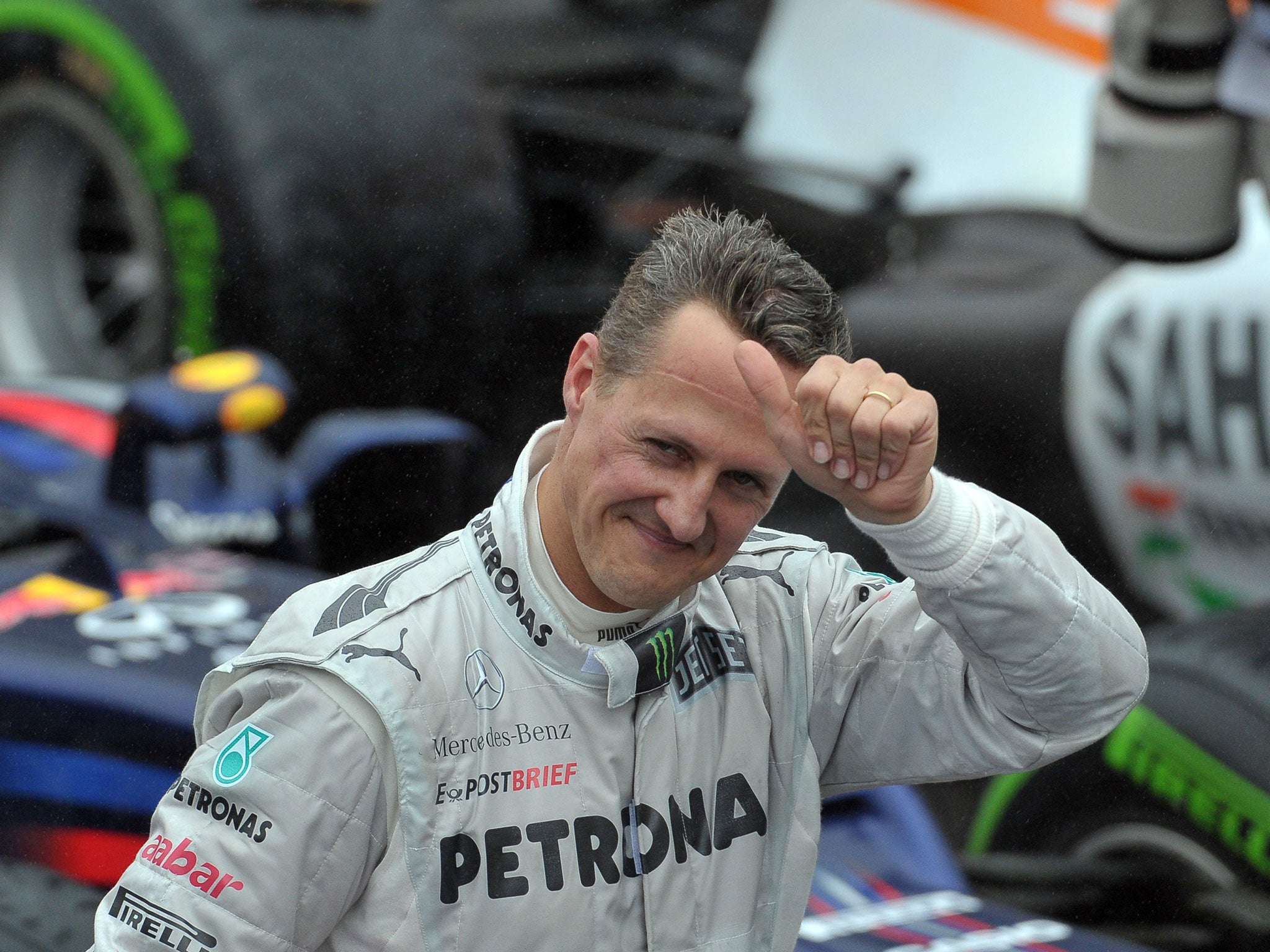 Michael Schumacher gives the thumbs up after qualifying first in Monaco