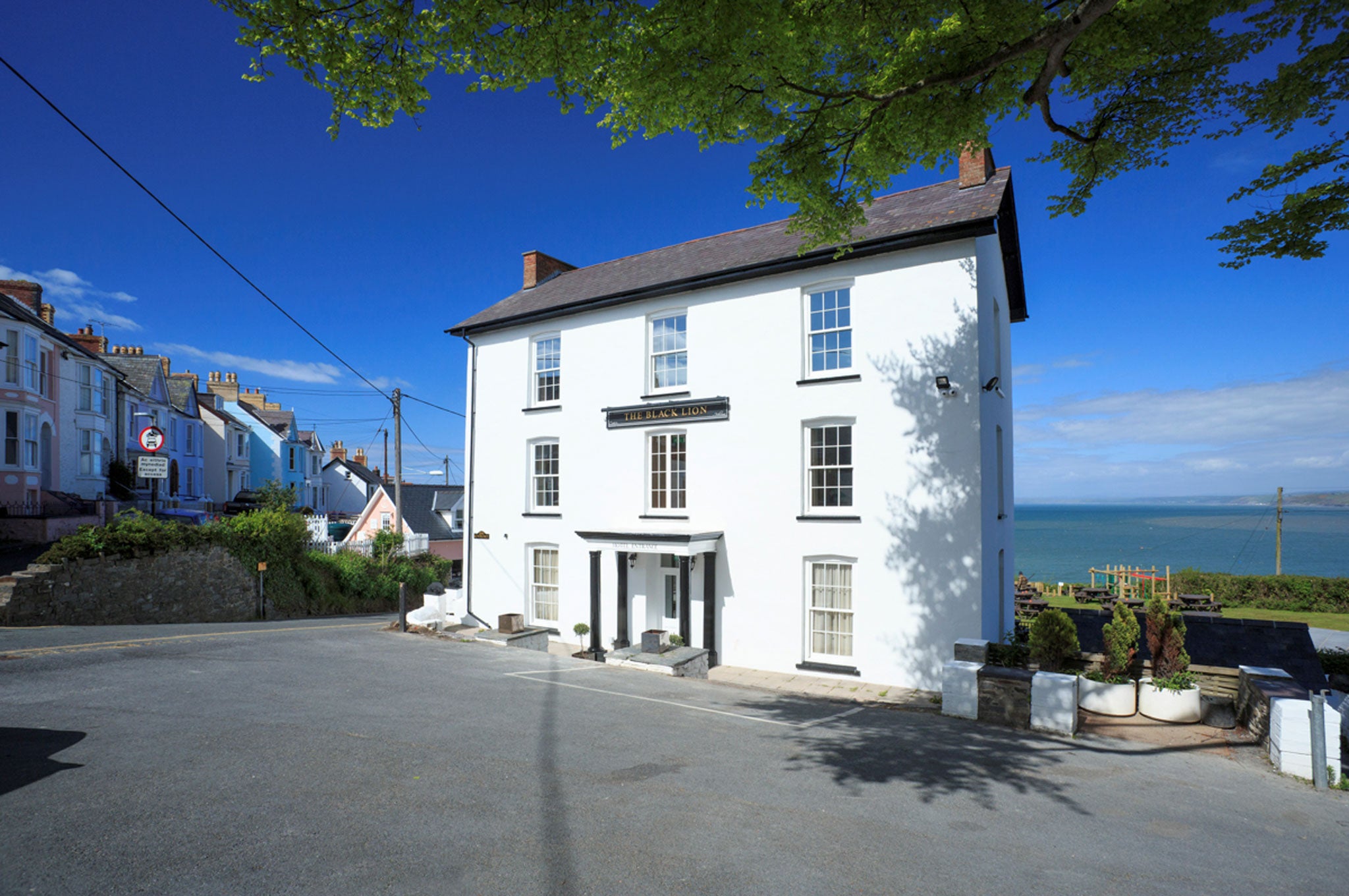 The Black Lion hotel in New Quay, which he described as 'waiting for Saturday night as an over-jolly girl waits for sailors'