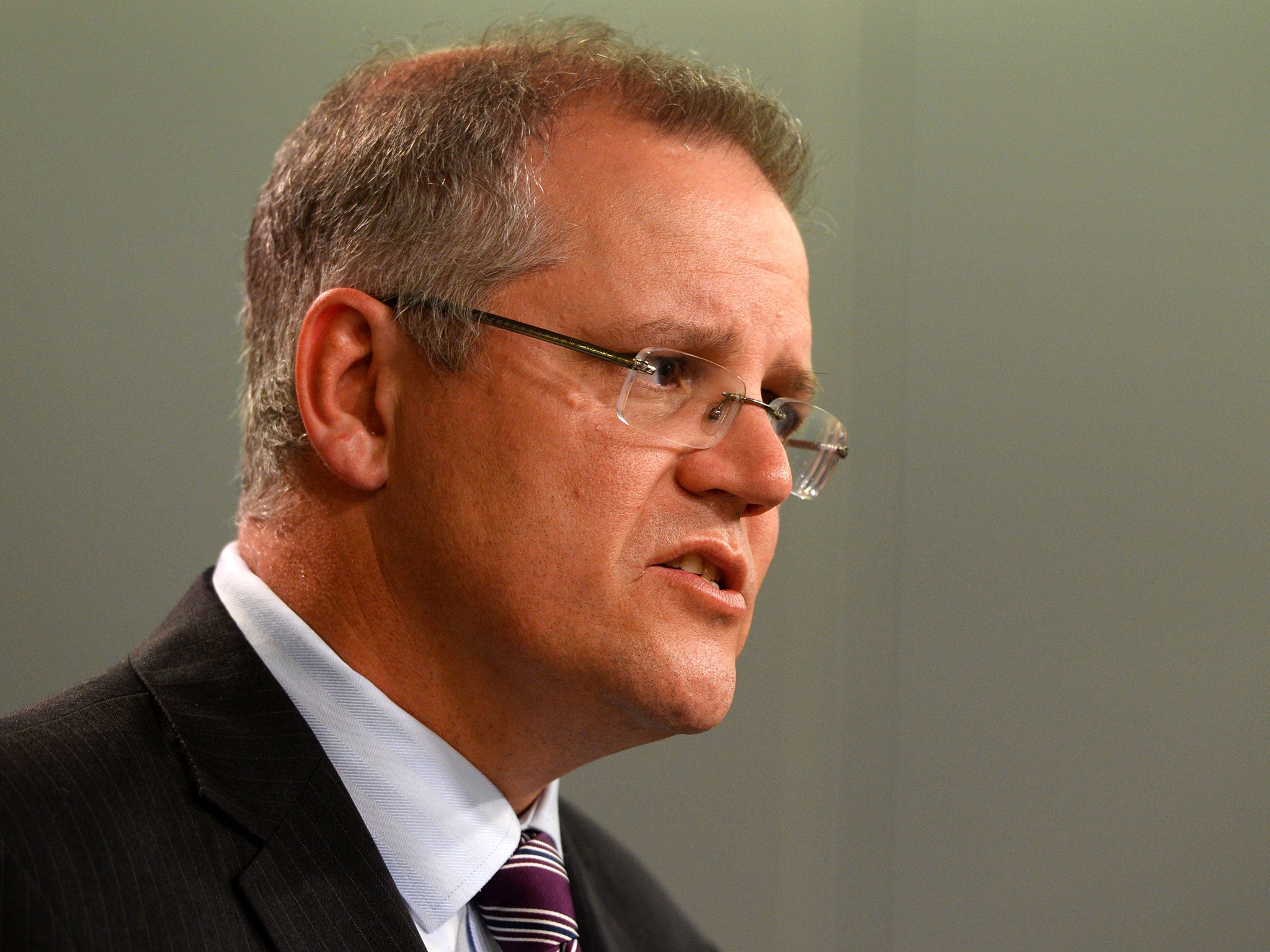 Australian Immigration Minister Scott Morrison speaks during a press conference in Sydney. A document leaked byrefugee advocates appears to show the draft of a code of conduct written by the Minister.