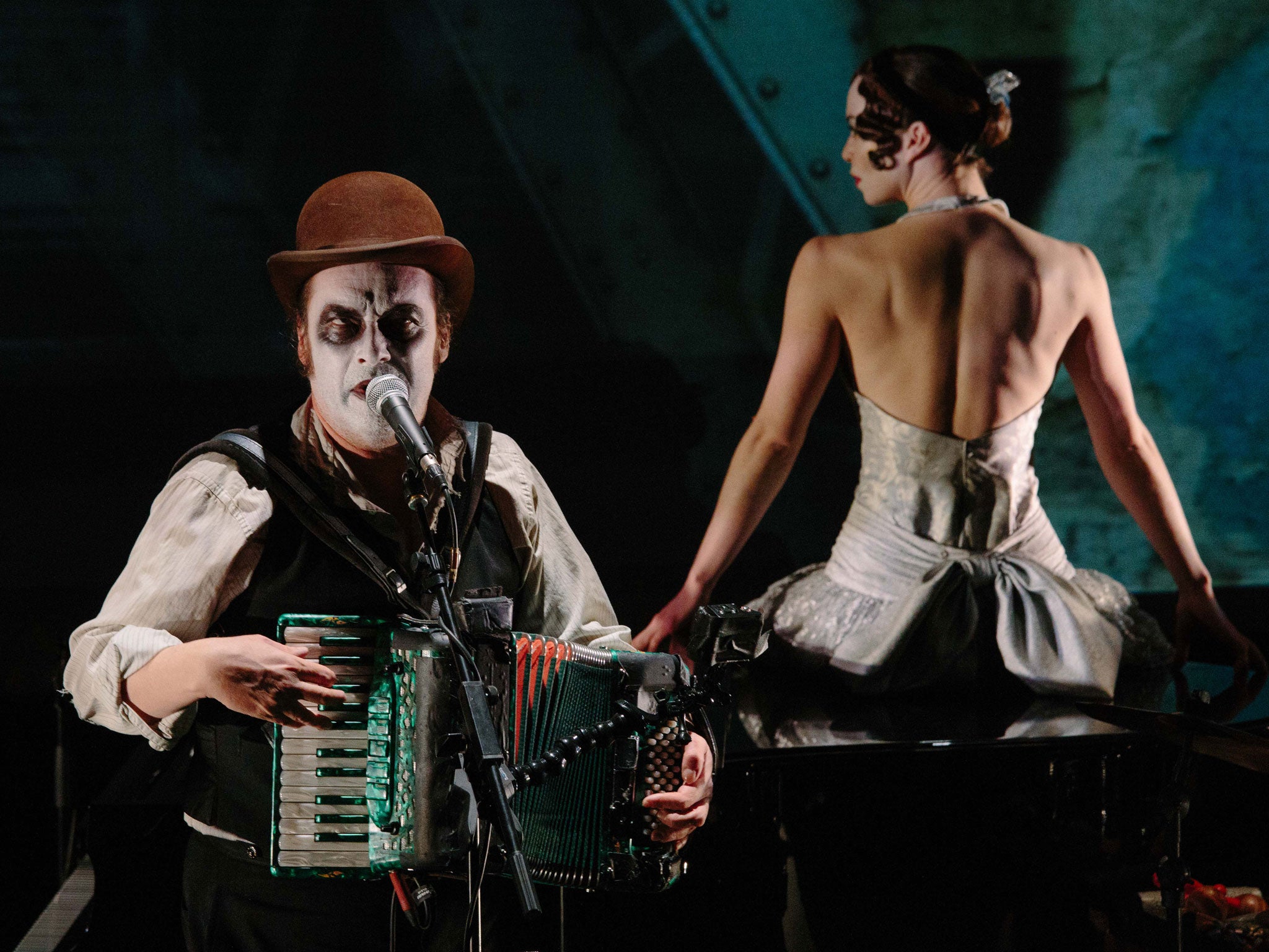 Direction and design by Mark Holthusen, words and music by Martyn Jacques, performed by the Tiger Lillies and Laura Caldow, commissioned by Opera North Projects.