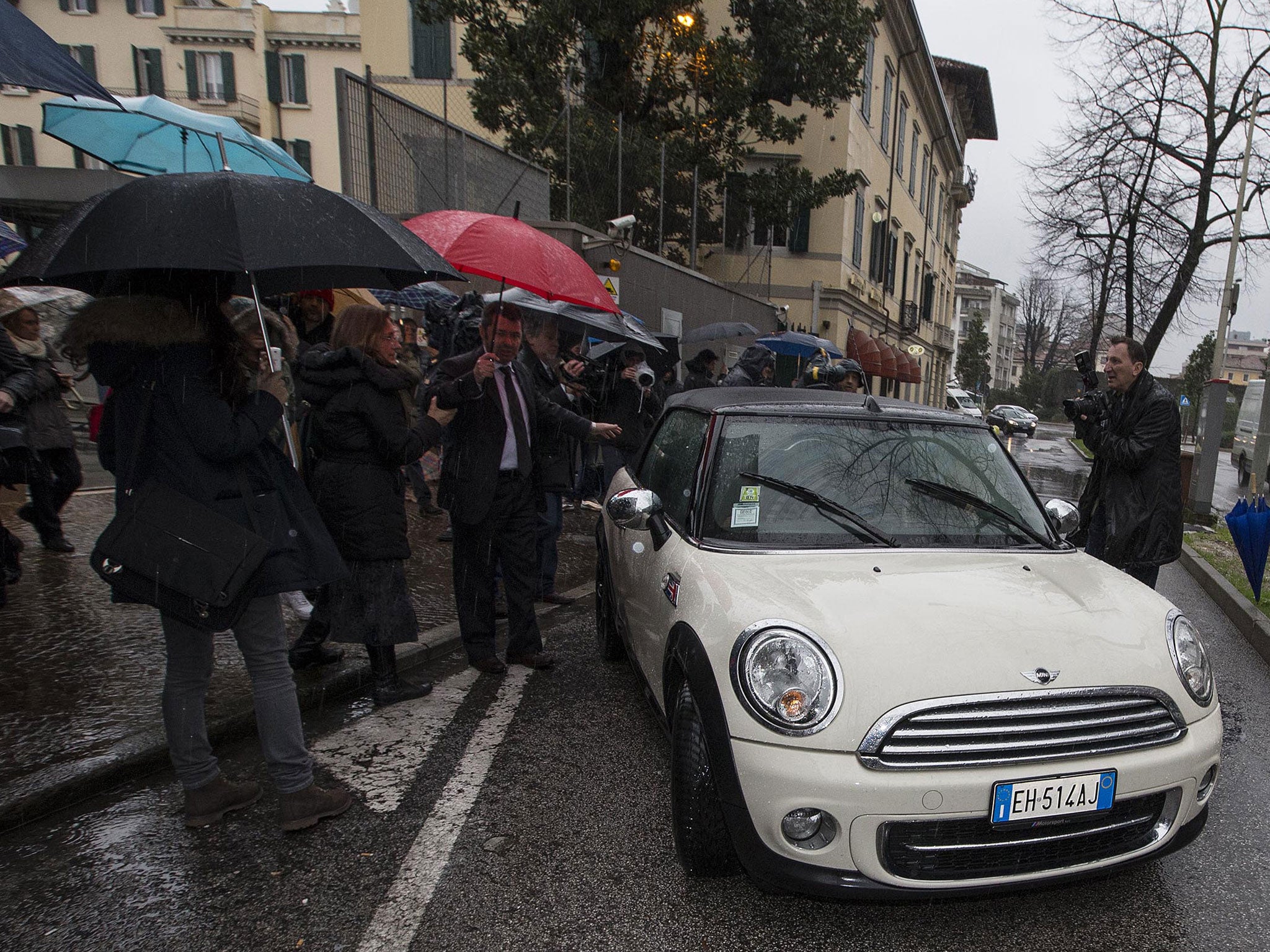 Raffaele Sollecito leaving the police station in the north-eastern town of Udine on Friday after surrendering his passport