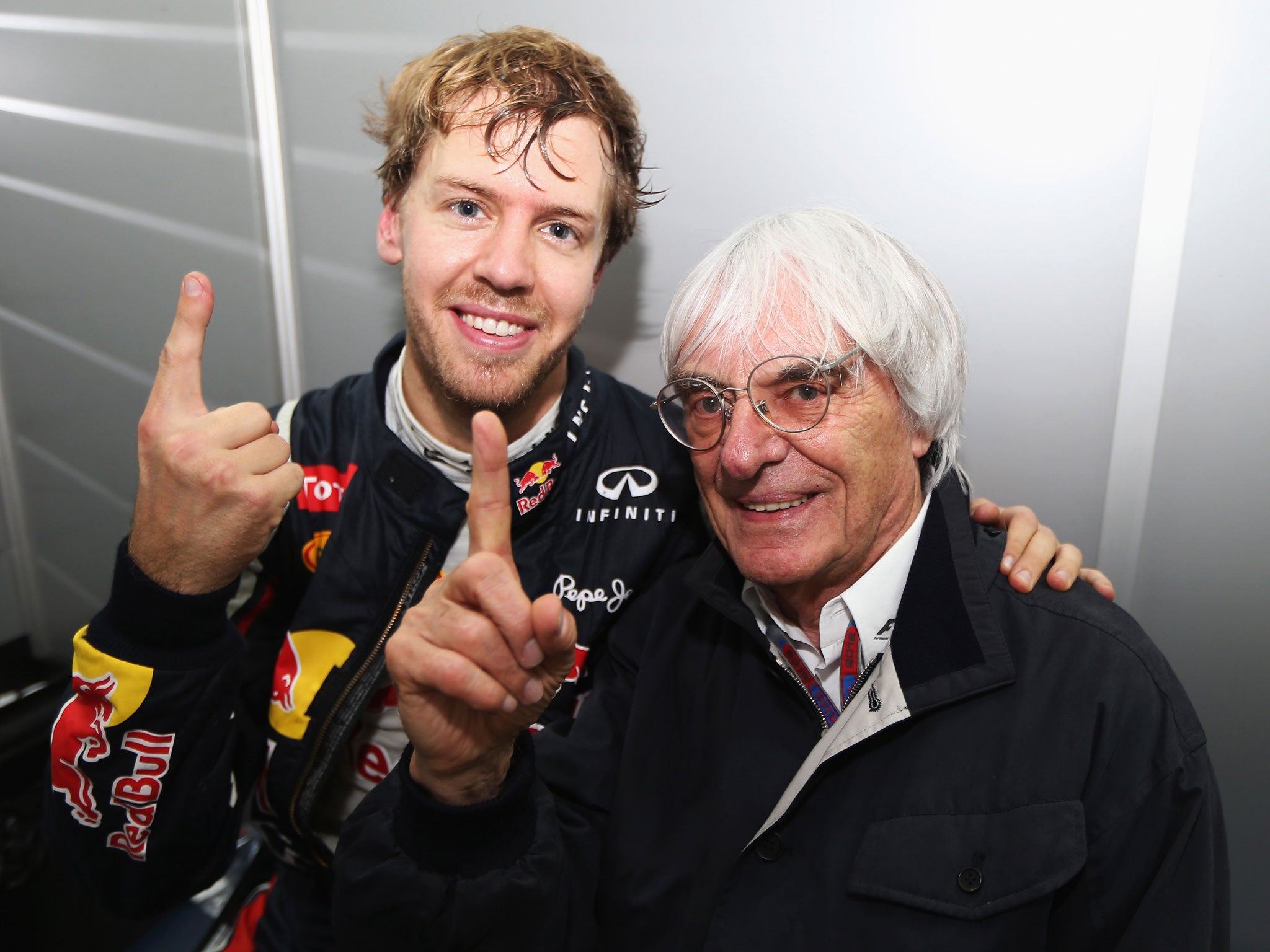 Double points? Sebastian Vettel, left, isn't happy but Bernie Ecclestone wants to expand on the idea