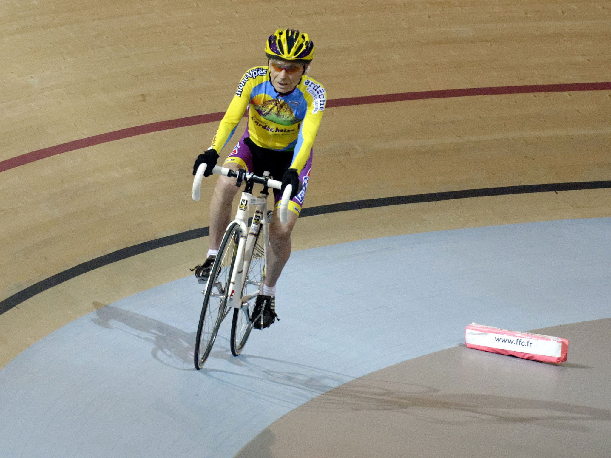 Robert Marchand, 102, rides to beat his own hourly record on January 31, 2014.