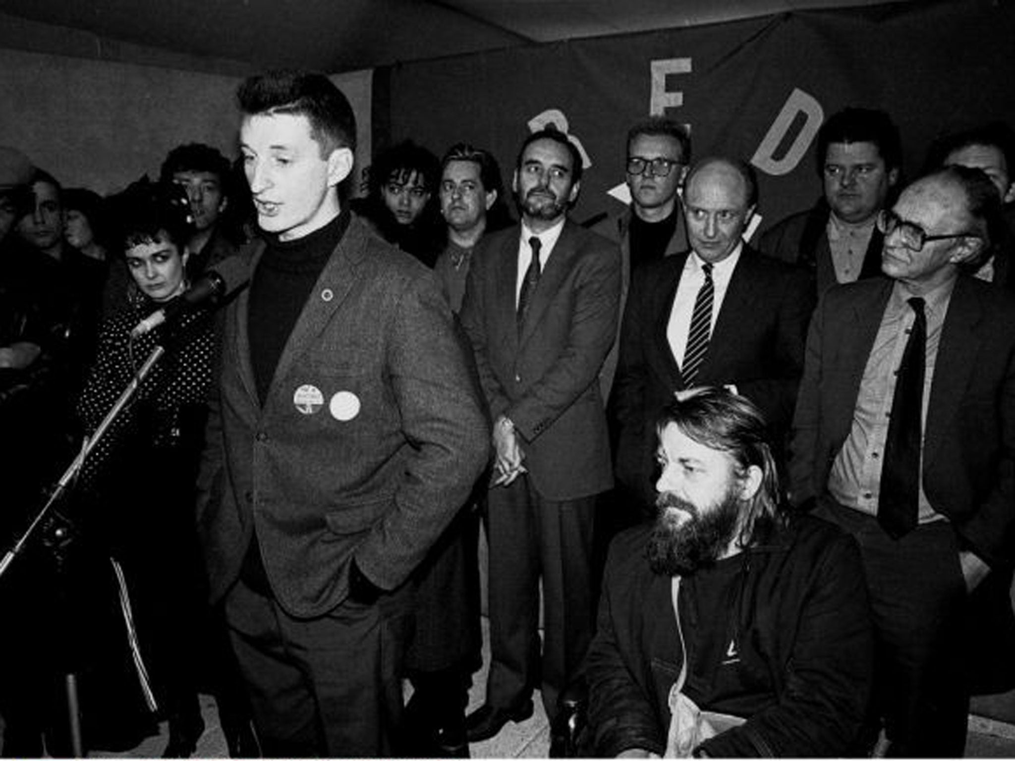 Stealth attack: The songs of Billy Bragg, seen here launching the pro-Labour, musicians’ collective Red Wedge in 1986, protested about life in Margaert Thatcher’s Britain