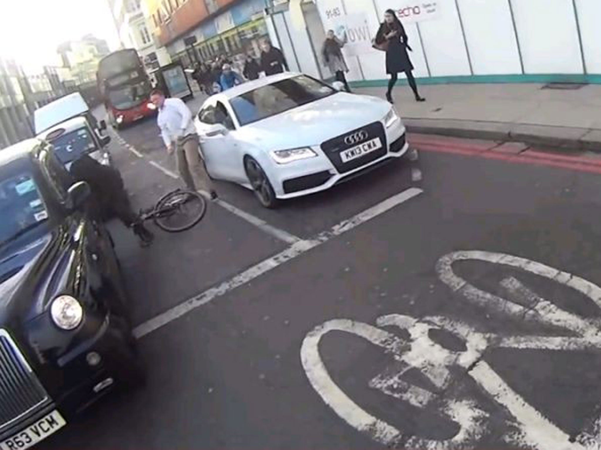 A London cyclist is attacked by the driver of this white Audi