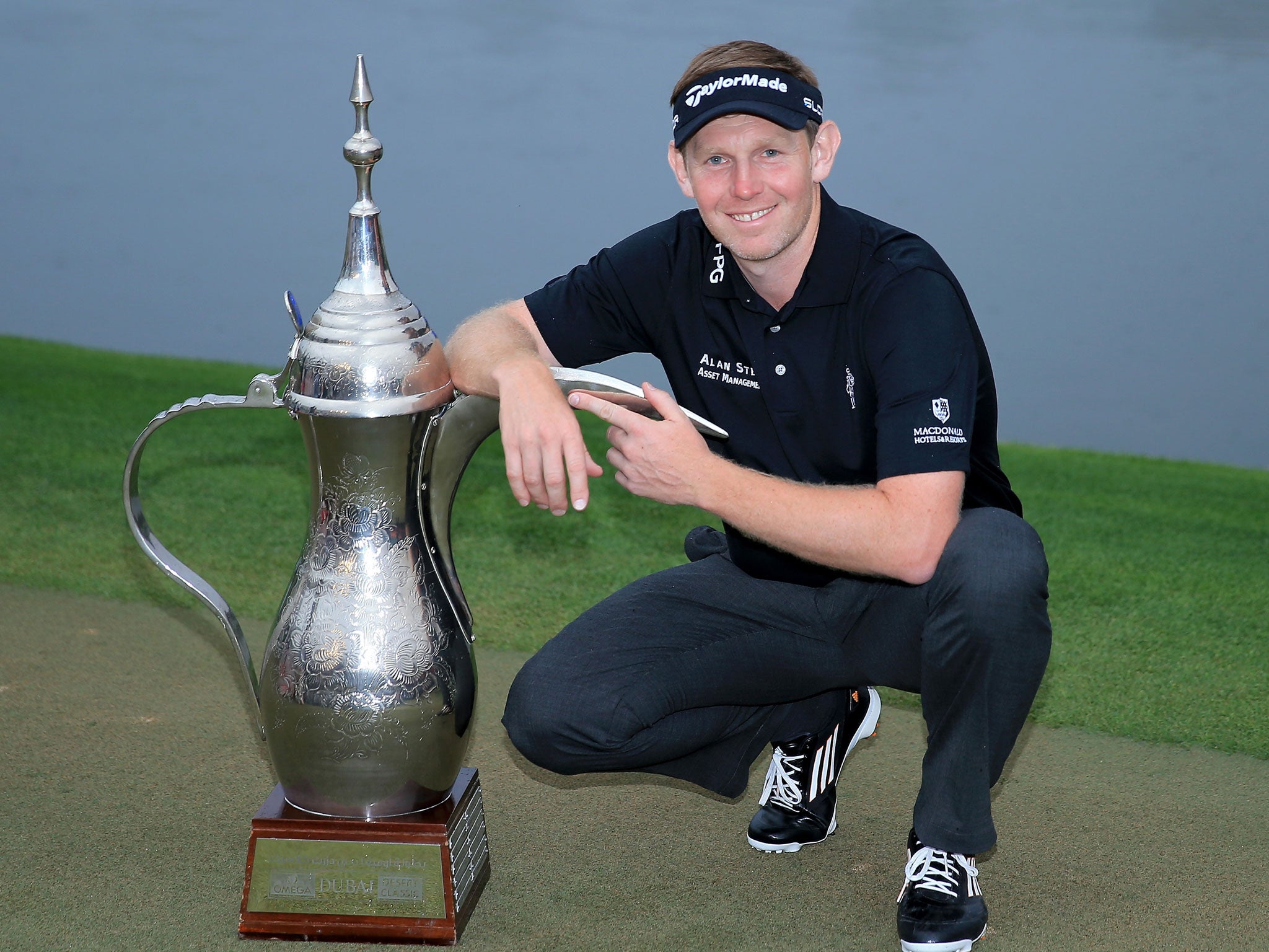 Stephen Gallacher and the Dubai Desert Classic trophy