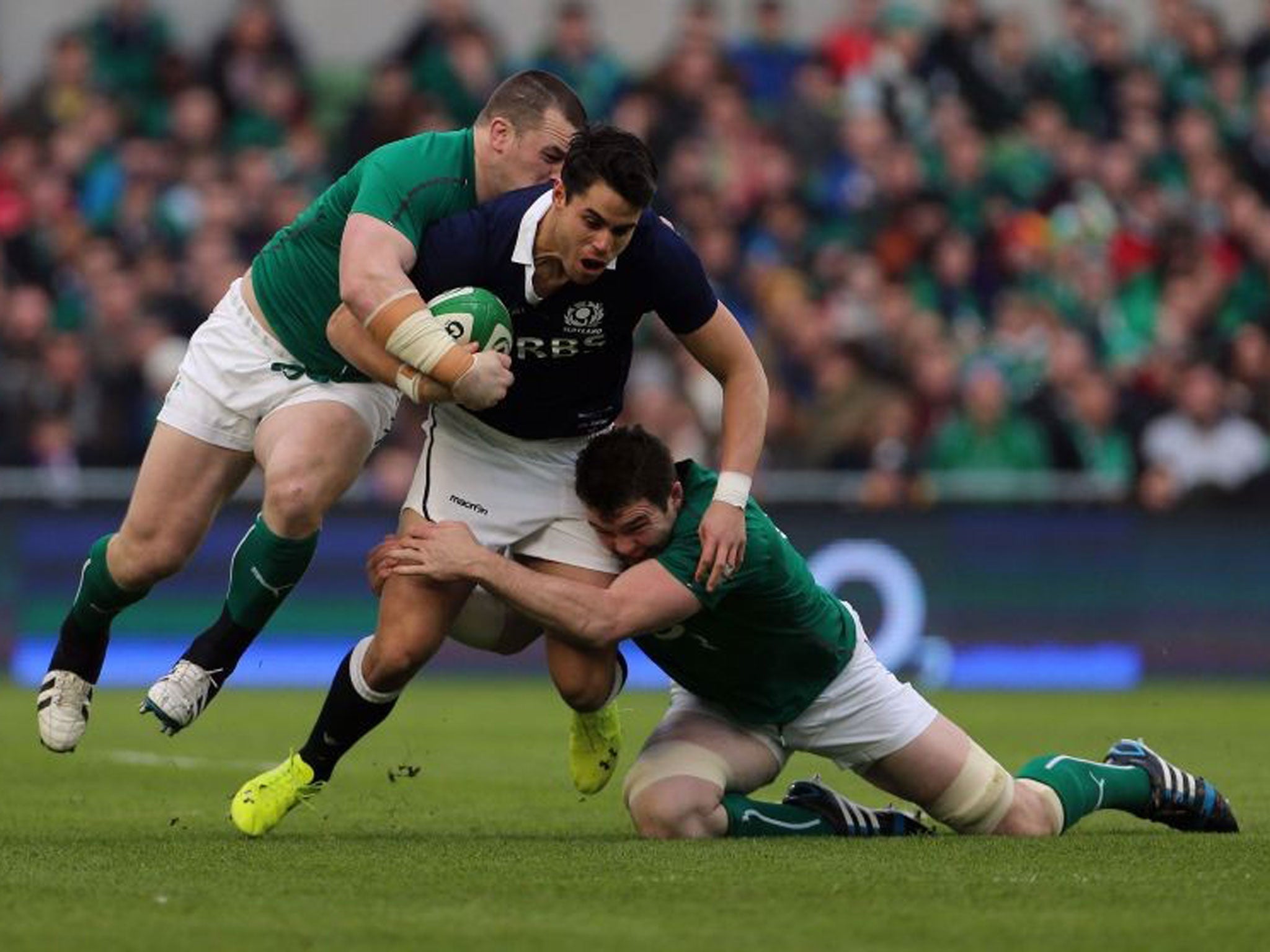 Ireland's Cian Healy and Ireland's Peter O'Mahony tackle Scotland's Sean Maitland during the RBS 6 Nations match at the Aviva Stadium, Dublin, Ireland