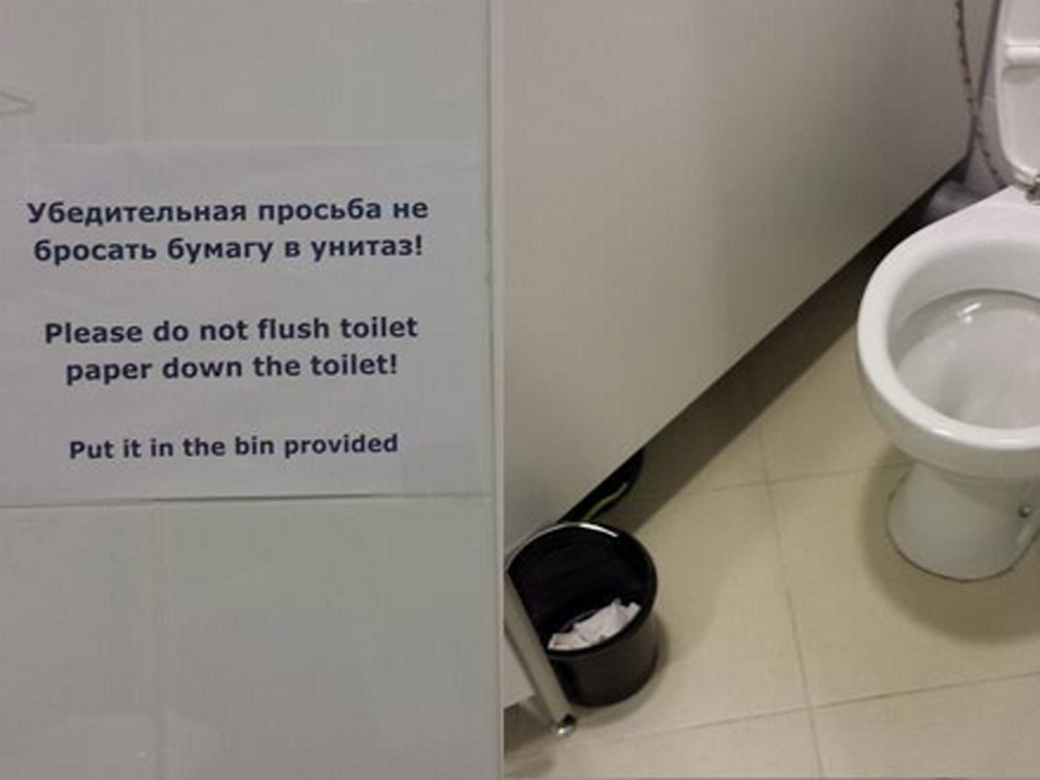 A sign in one of the toilets