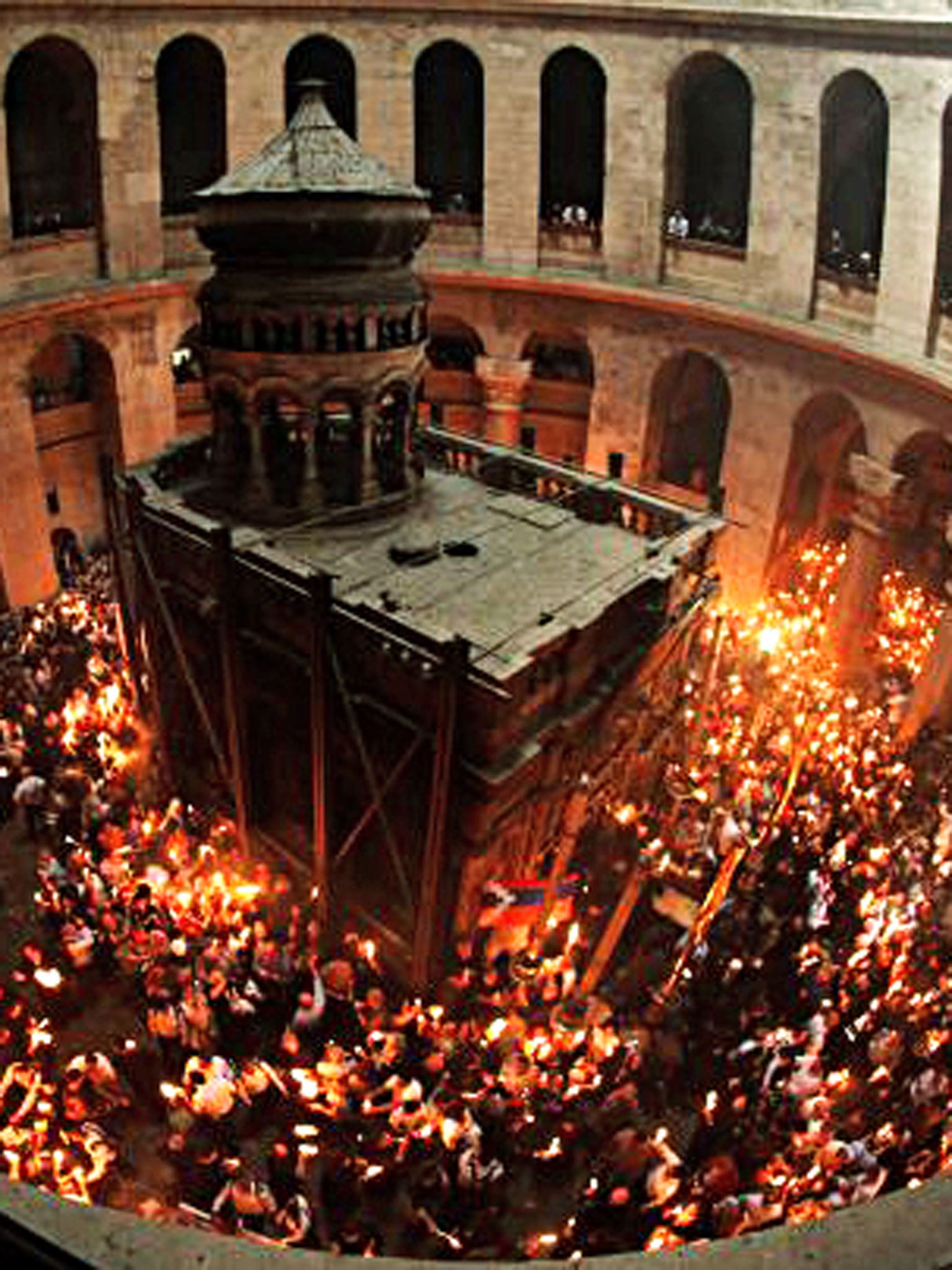 Church of the Holy Sepulchre, Jerusalem. 'So fraught that even the rival priests had an animated set-to. Almost impossible to recall that it is a sacred place.'