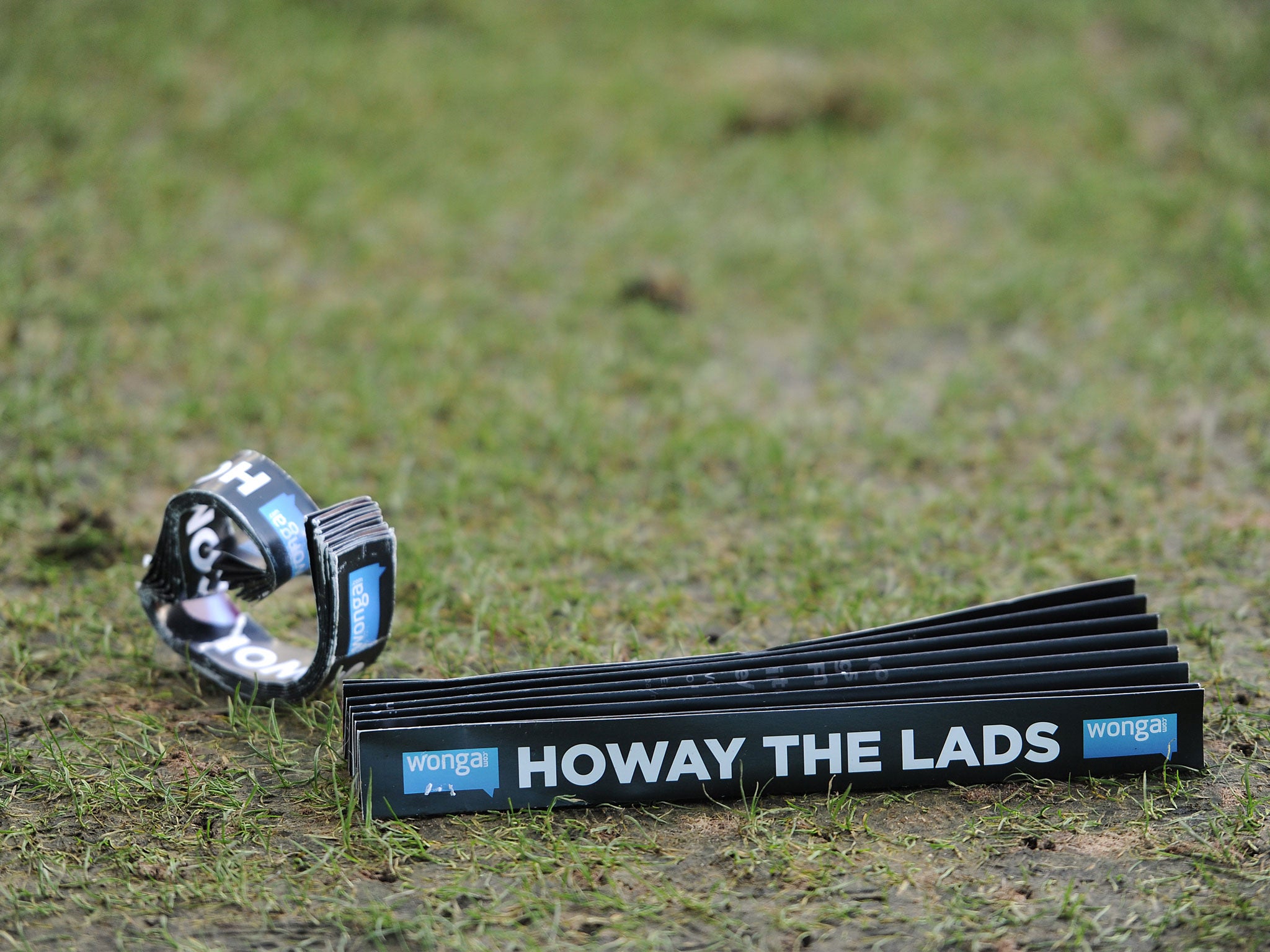 A Newcastle support banner is thrown onto the St James' Park pitch during the 3-0 defeat to Sunderland