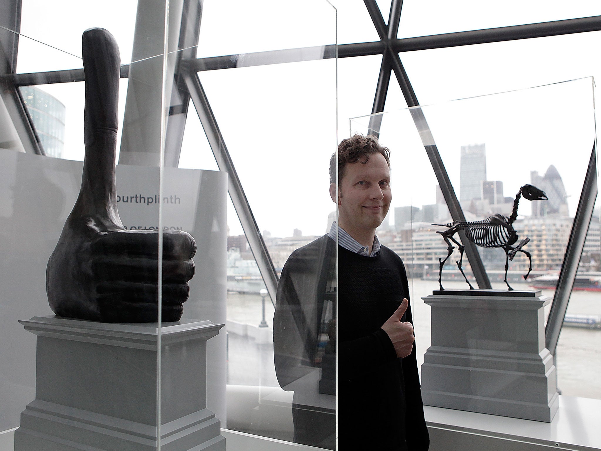 David Shrigley with a maquette of his sculpture ‘Really Good’ (Getty)